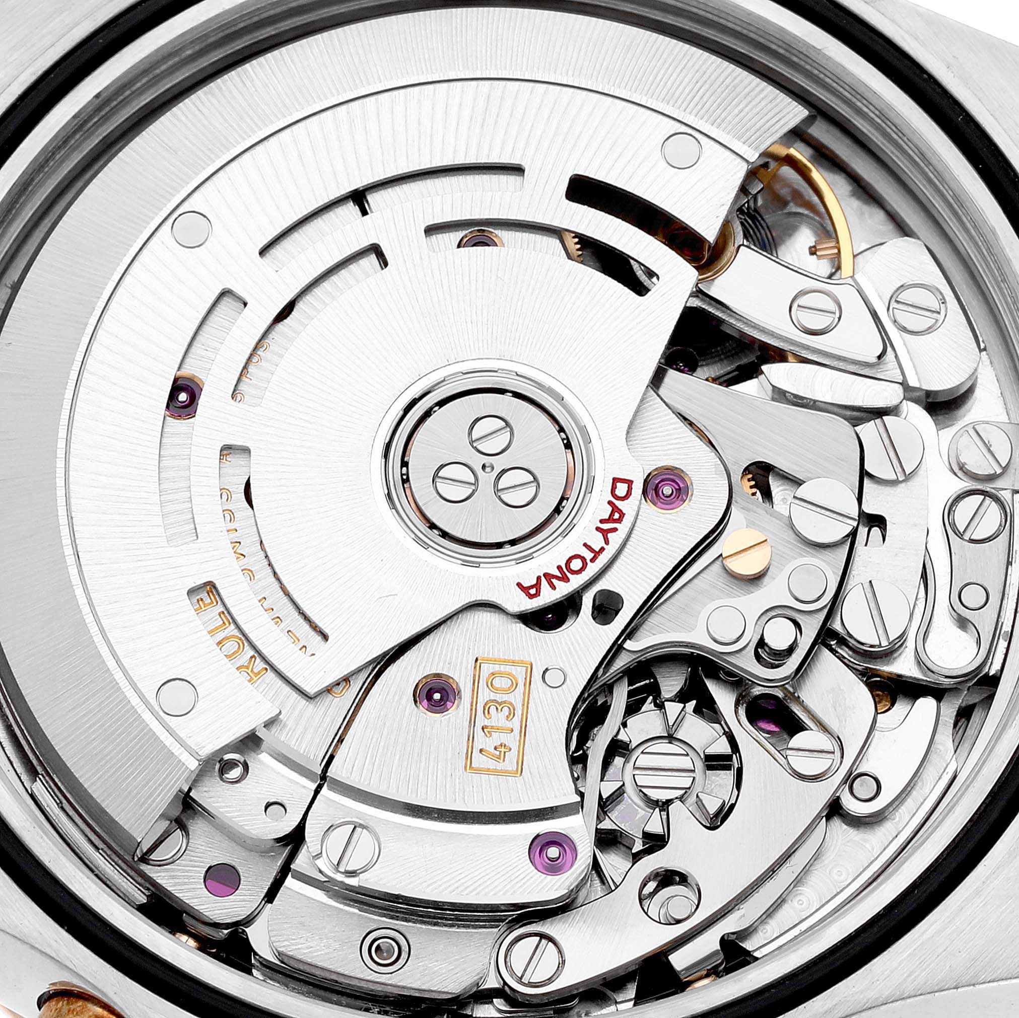 This image shows the intricate internal mechanism of a Rolex Daytona 116523 Men
s Steel and Gold (two tone) White Dial 116523 Men
s Steel and Gold (two tone) White Dial watch, viewed from the back.
