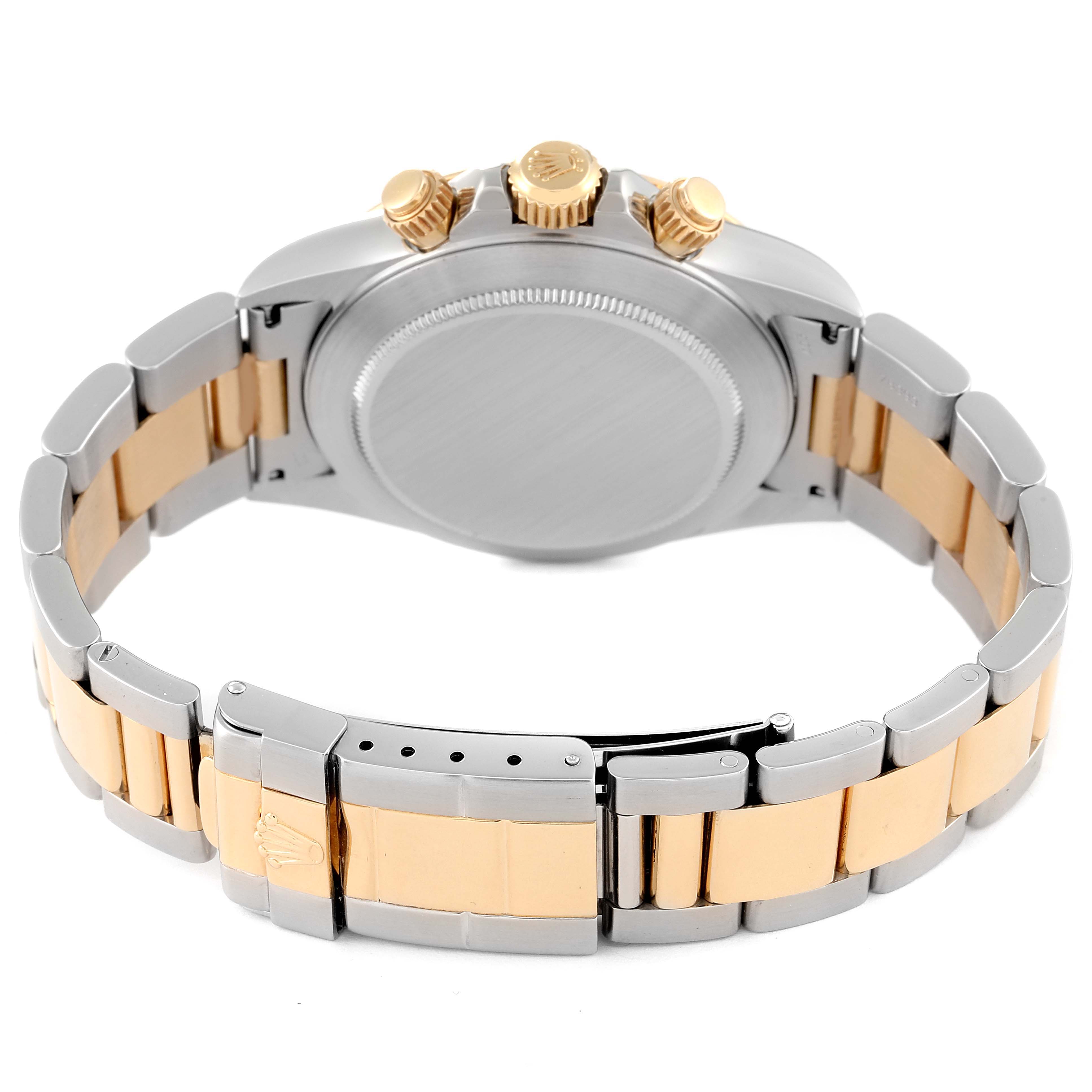 This image shows the back view and bracelet of a Rolex Daytona 16523 Men
s Steel and Gold (two tone) White Dial 16523 Men
s Steel and Gold (two tone) White Dial watch, highlighting the clasp, case back, and the two-tone bracelet links.