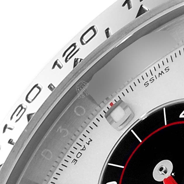 The image shows a close-up of the bezel, part of the dial, and the "SWISS MADE" marking of the Rolex Daytona 116509 Men's White Gold Silver Dial 116509 Men's White Gold Silver Dial watch.