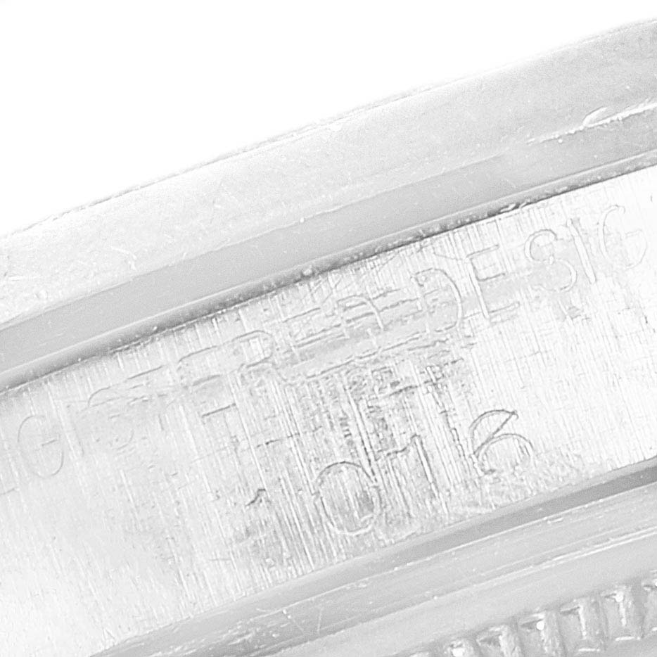The image shows a close-up of the model number and engravings on the casing of a Rolex Vintage Collection 1016 Men
s Stainless Steel  1016 Men
s Stainless Steel  watch.