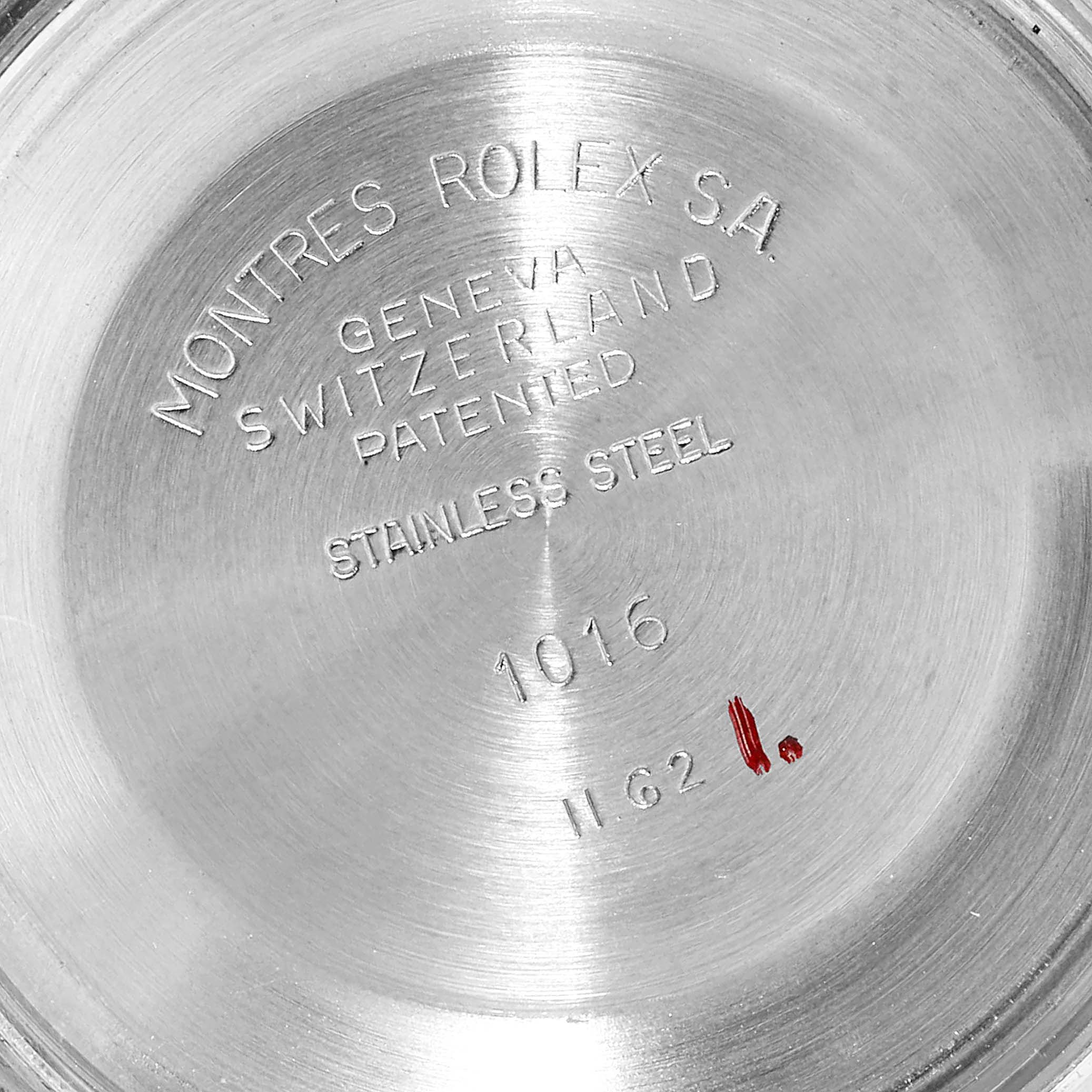 This image shows the engraved back case of a Rolex Vintage Collection 1016 Men
s Stainless Steel  1016 Men
s Stainless Steel  watch model 1016.