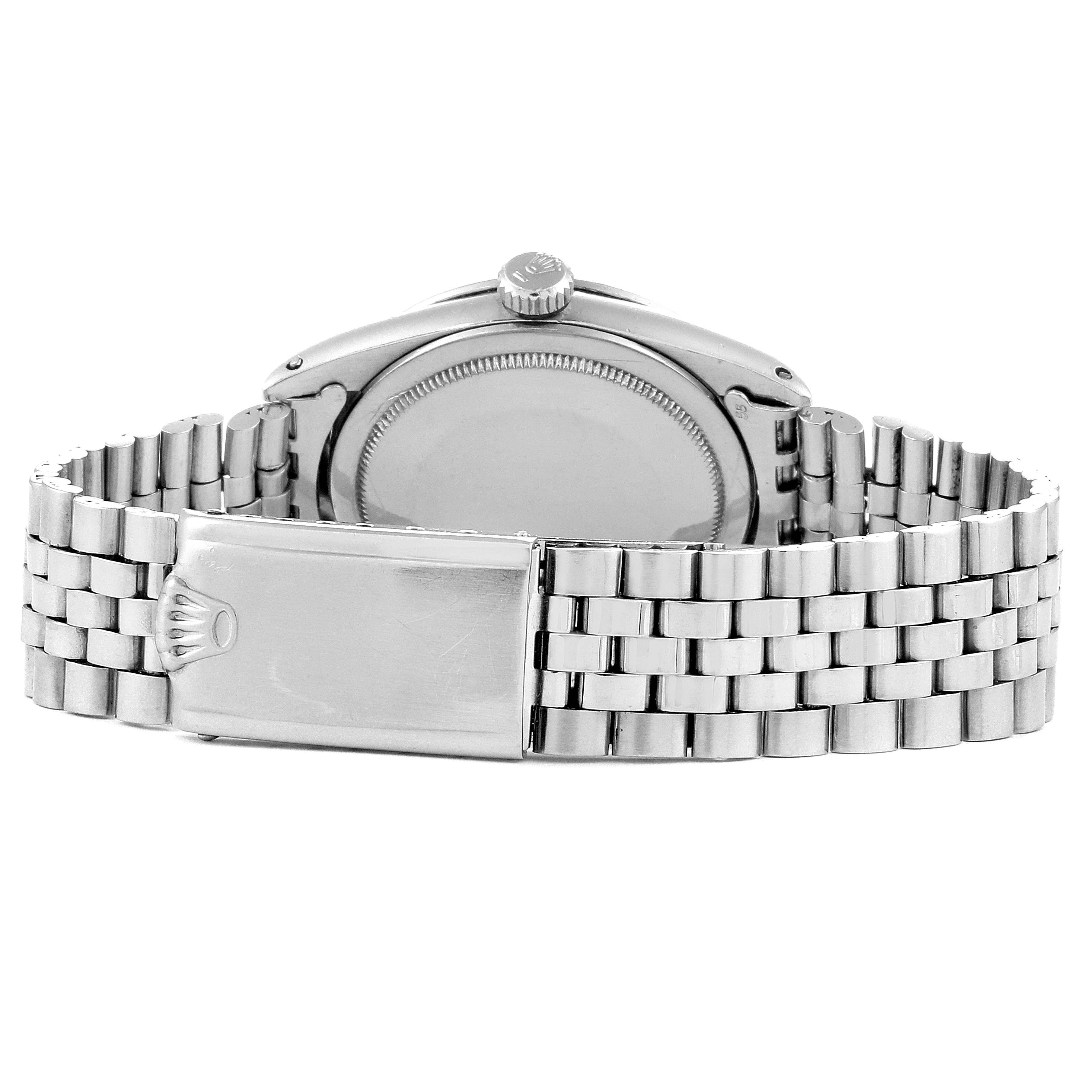 The image shows the back view of the Rolex Vintage Collection 1016 Men
s Stainless Steel  1016 Men
s Stainless Steel  model, highlighting the case back and the clasp of the metal bracelet.