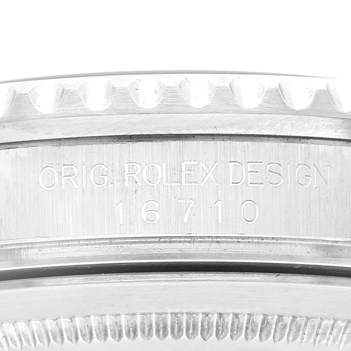 The image shows an angled close-up of the casing and reference number (16710) of a Rolex GMT-Master 16710 Men
s Stainless Steel Black Dial 16710 Men
s Stainless Steel Black Dial watch.