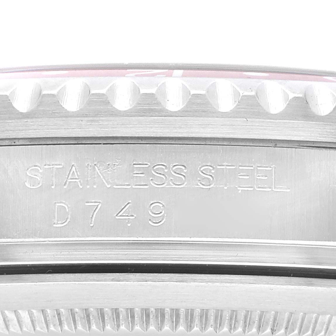 This is a close-up view of the stainless steel case back and the engravings on a Rolex GMT-Master 16710 Men's Stainless Steel Black Dial 16710 Men's Stainless Steel Black Dial watch.