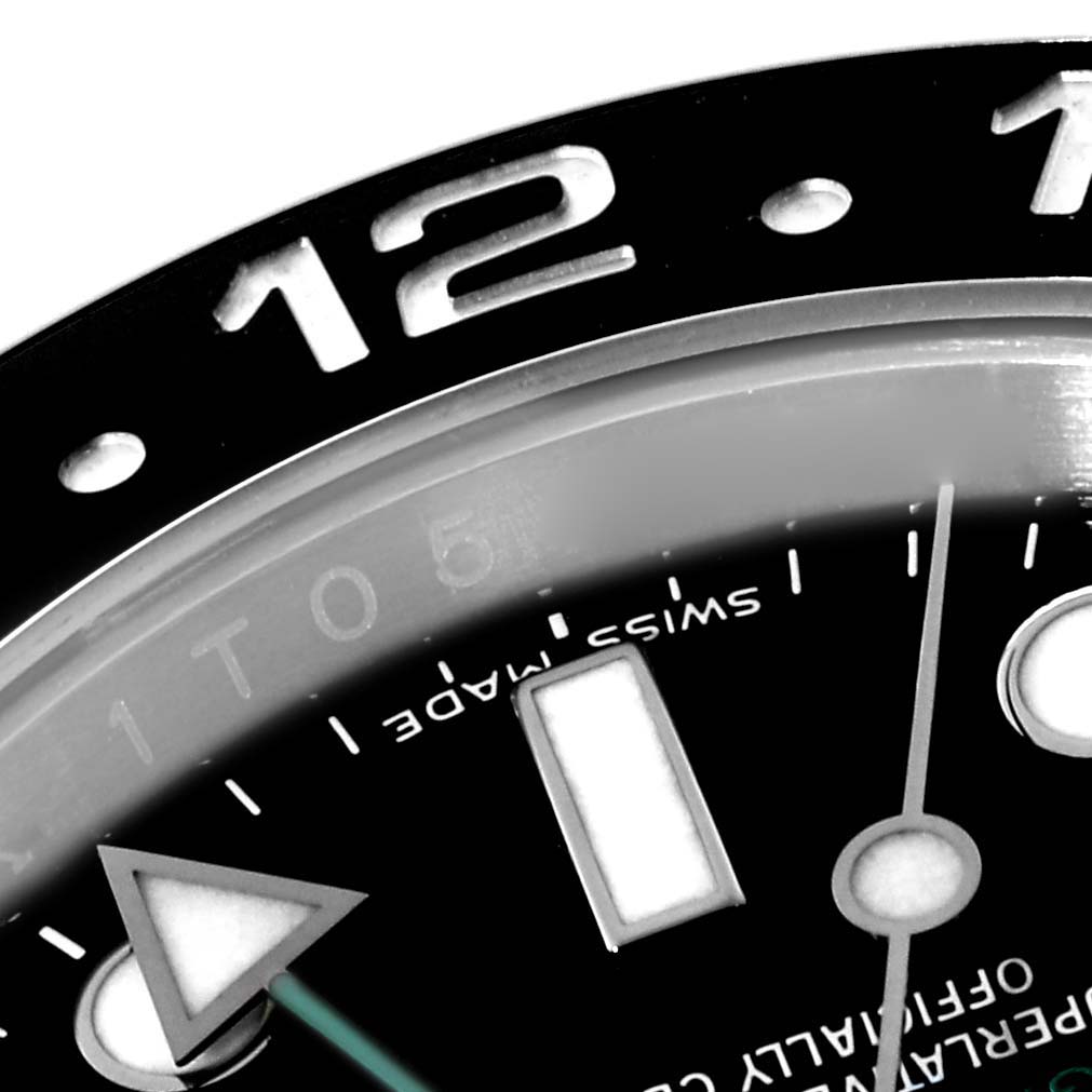 The image shows a close-up of the bezel, hour markers, and hands of a Rolex GMT-Master 116710 Men
s Stainless Steel Black Dial 116710 Men
s Stainless Steel Black Dial watch.
