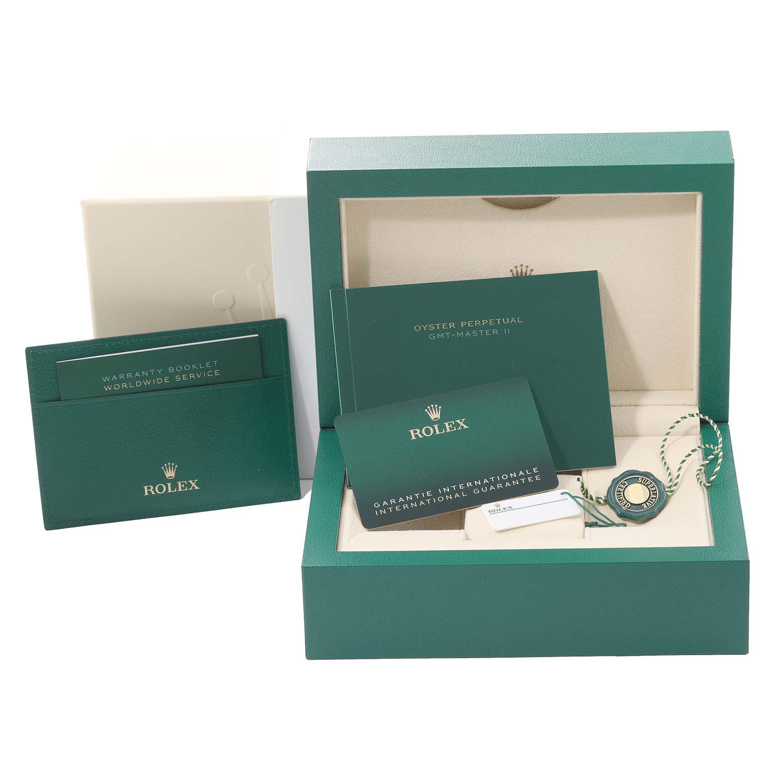 This image shows the box, international guarantee, warranty booklet, and other accessories for a Rolex GMT-Master 126713 Men's Steel and Gold (two tone) Black Dial 126713 Men's Steel and Gold (two tone) Black Dial watch.