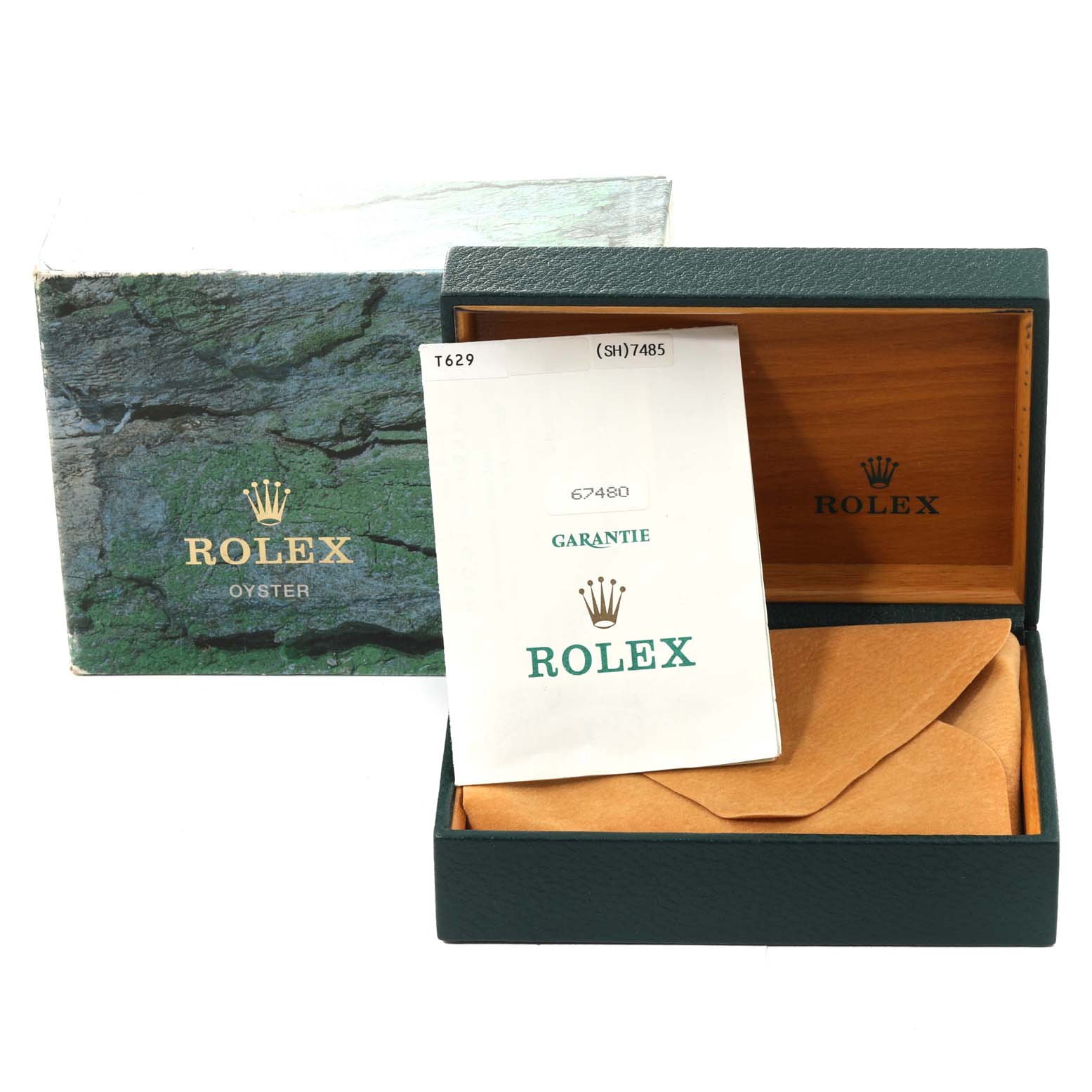 The image shows the Rolex Mid-Size 67480 Women
s Stainless Steel Blue Dial 67480 Women
s Stainless Steel Blue Dial model box, warranty papers, and green packaging from an angled view.