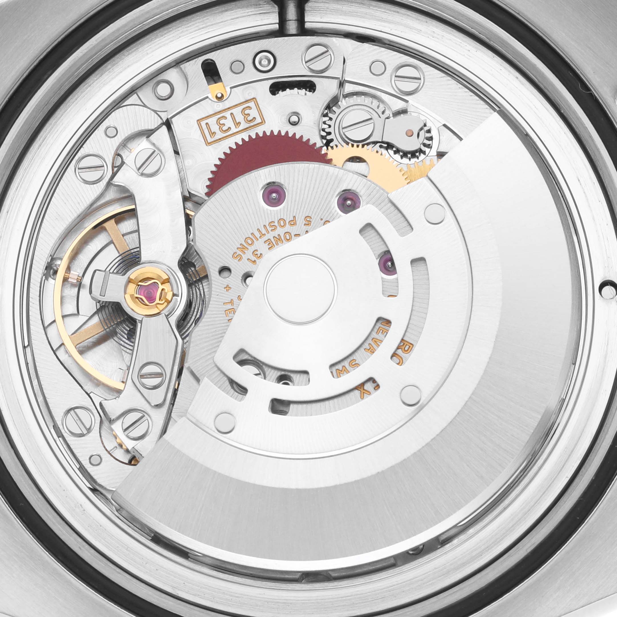 The image shows a close-up of the inner mechanical movement parts of a Rolex Milgauss 116400 Men
s Stainless Steel White Dial 116400 Men
s Stainless Steel White Dial watch.