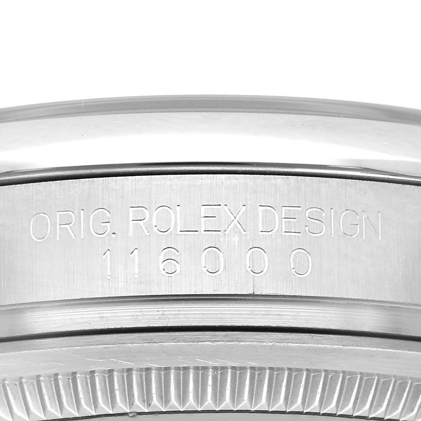 This image shows a close-up of the side engraving on the case of a Rolex Oyster Perpetual 62899 Men's Stainless Steel Silver Dial 62899 Men's Stainless Steel Silver Dial model, displaying "ORIG. ROLEX DESIGN" and the model number 116000.