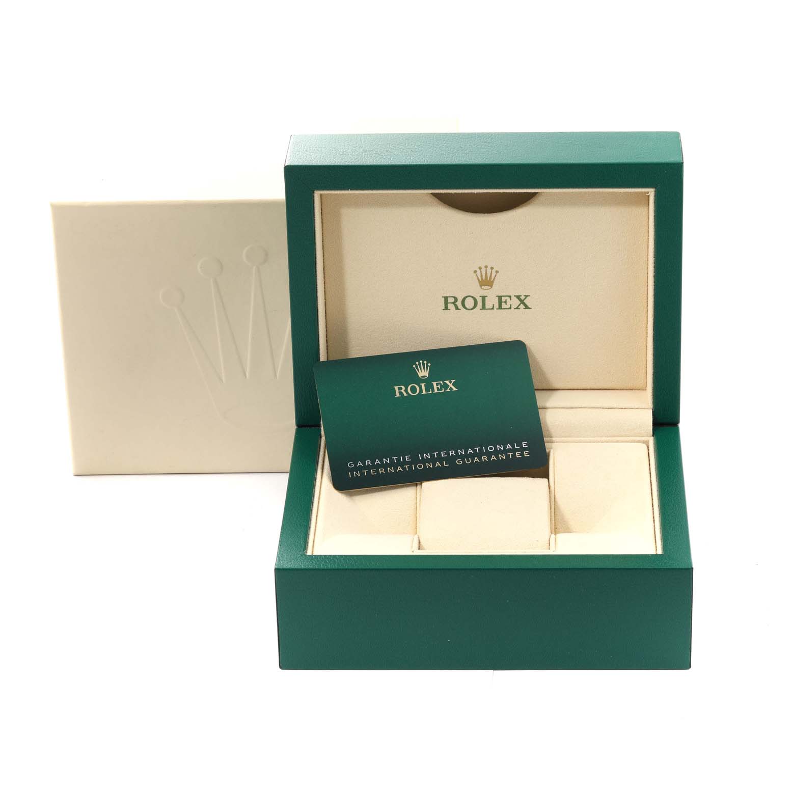 This image shows the packaging box, a green warranty card, and an inner cushion of a Rolex Oyster Perpetual 124300 Men's Stainless Steel Green Dial 124300 Men's Stainless Steel Green Dial watch.