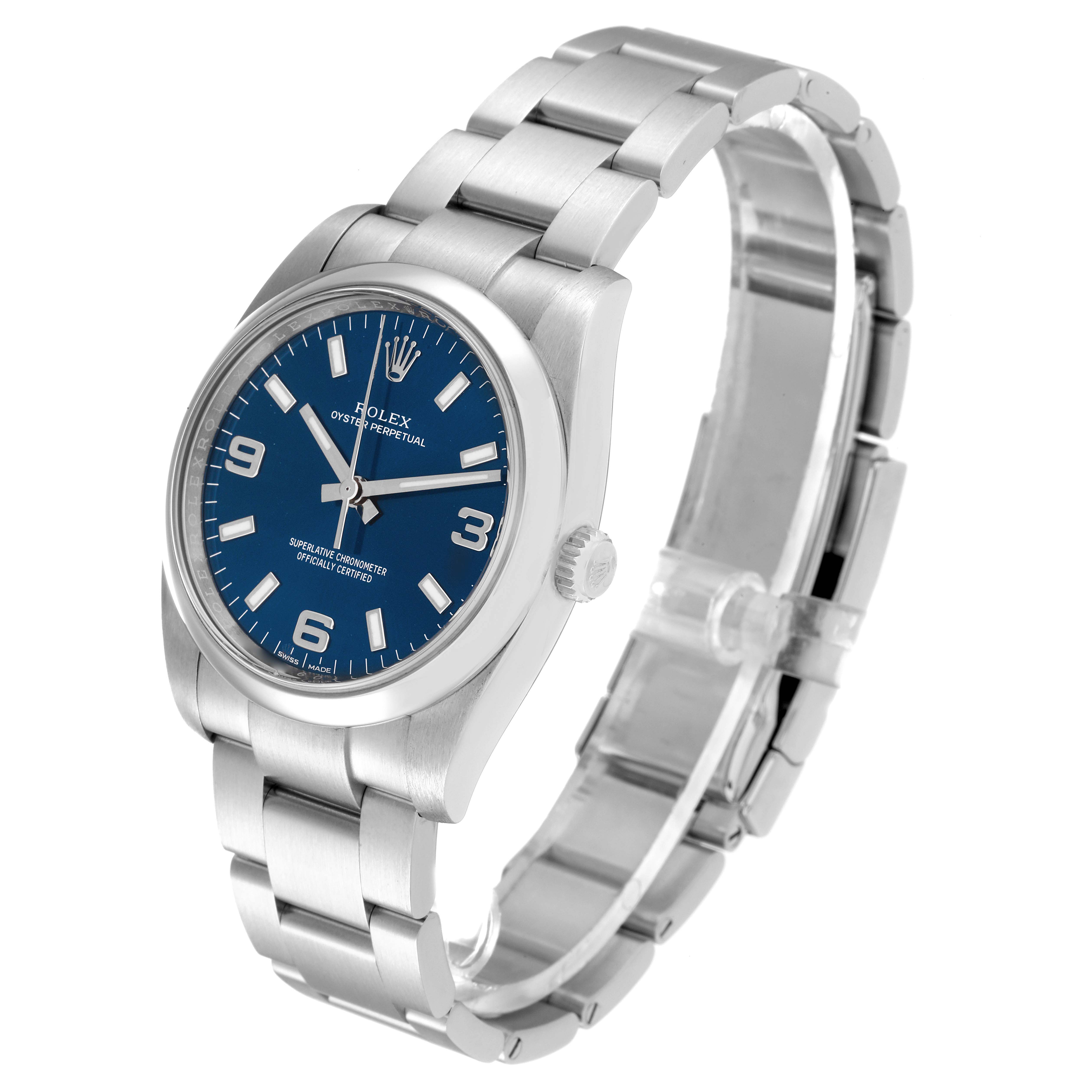 This Rolex Oyster Perpetual 114200 Men's Stainless Steel Blue Dial 114200 Men's Stainless Steel Blue Dial watch is shown from a three-quarter angle, displaying its blue dial, stainless steel case, and bracelet.