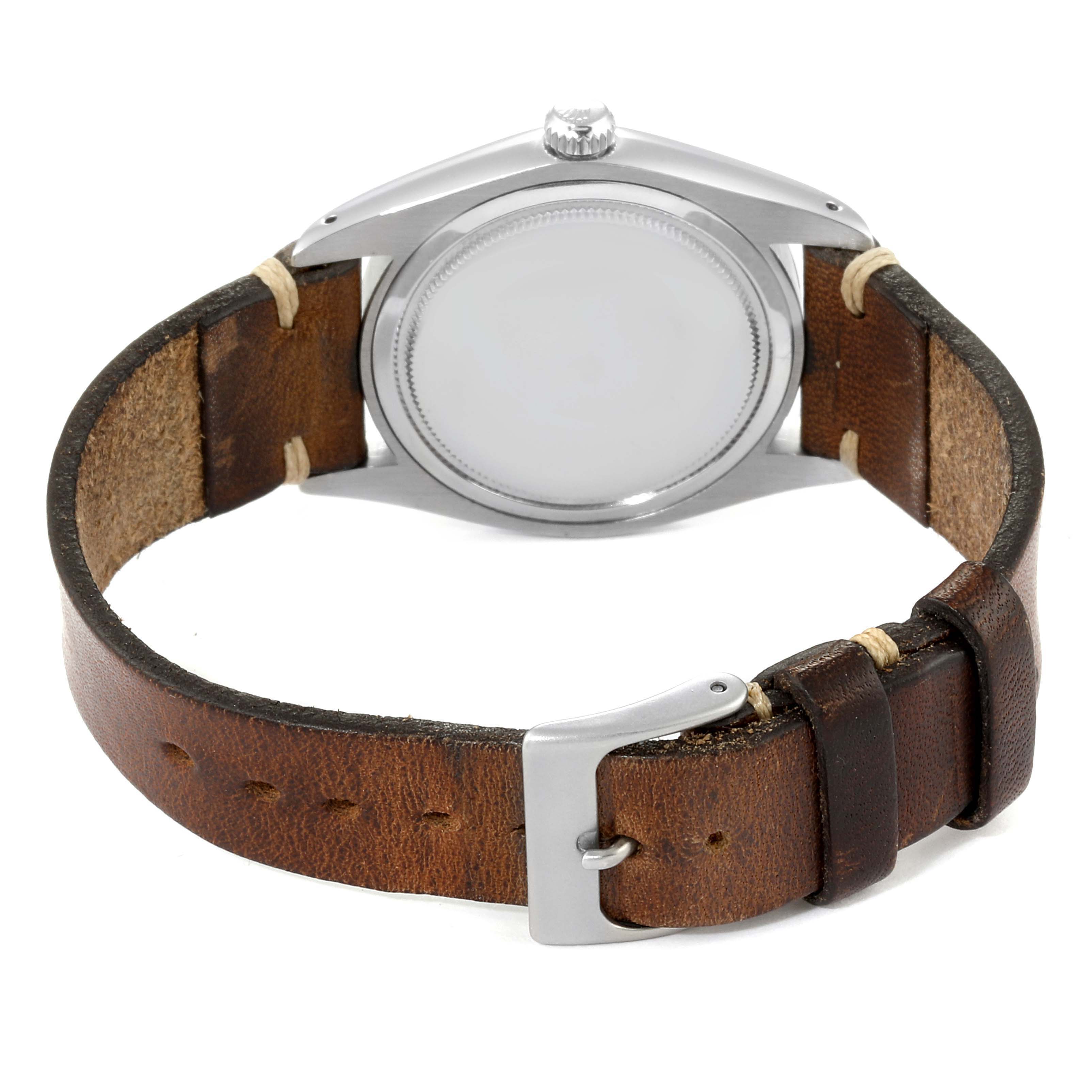 The image shows the back and strap of the Rolex Vintage Collection 6694 Men's Stainless Steel Champagne Dial 6694 Men's Stainless Steel Champagne Dial model from a rear angle.