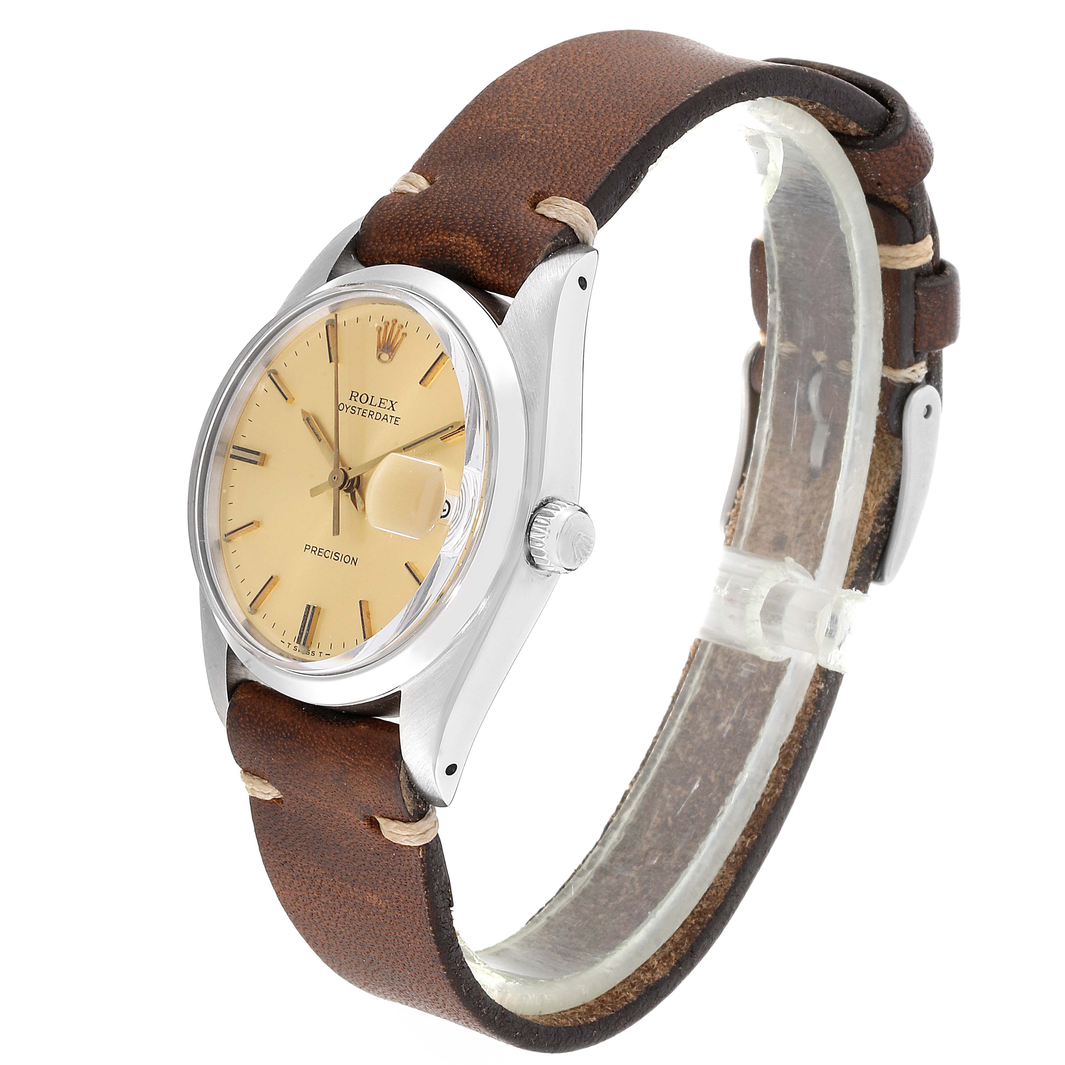 This image shows a side angle of the Rolex Vintage Collection 6694 Men's Stainless Steel Champagne Dial 6694 Men's Stainless Steel Champagne Dial watch, highlighting the face, crown, and brown leather strap.
