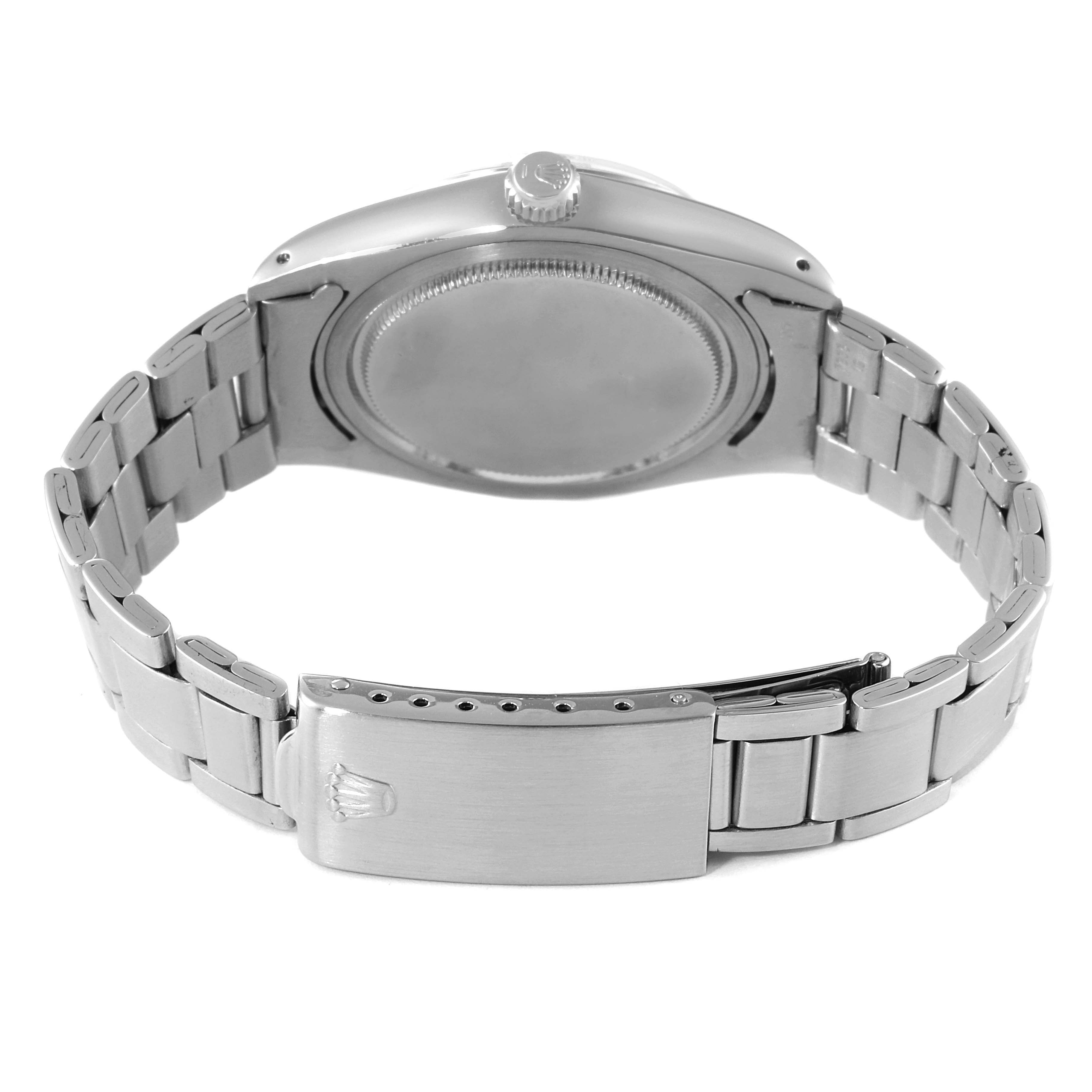 This image shows the back case, crown, and clasp of the Rolex Vintage Collection 6694 Men
s Stainless Steel Silver Dial 6694 Men
s Stainless Steel Silver Dial watch.