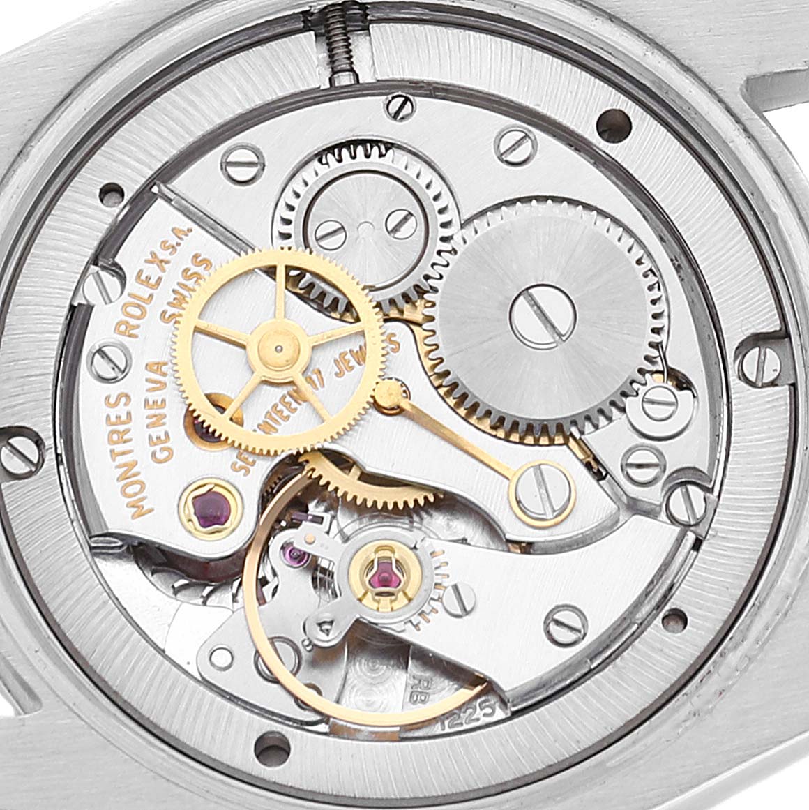 The image shows a close-up view of the internal mechanism of a Rolex Vintage Collection 6694 Men
s Stainless Steel Silver Dial 6694 Men
s Stainless Steel Silver Dial watch.