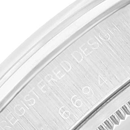This close-up angle shows a segment of the case back with engravings of the Vintage Collection model by Rolex.