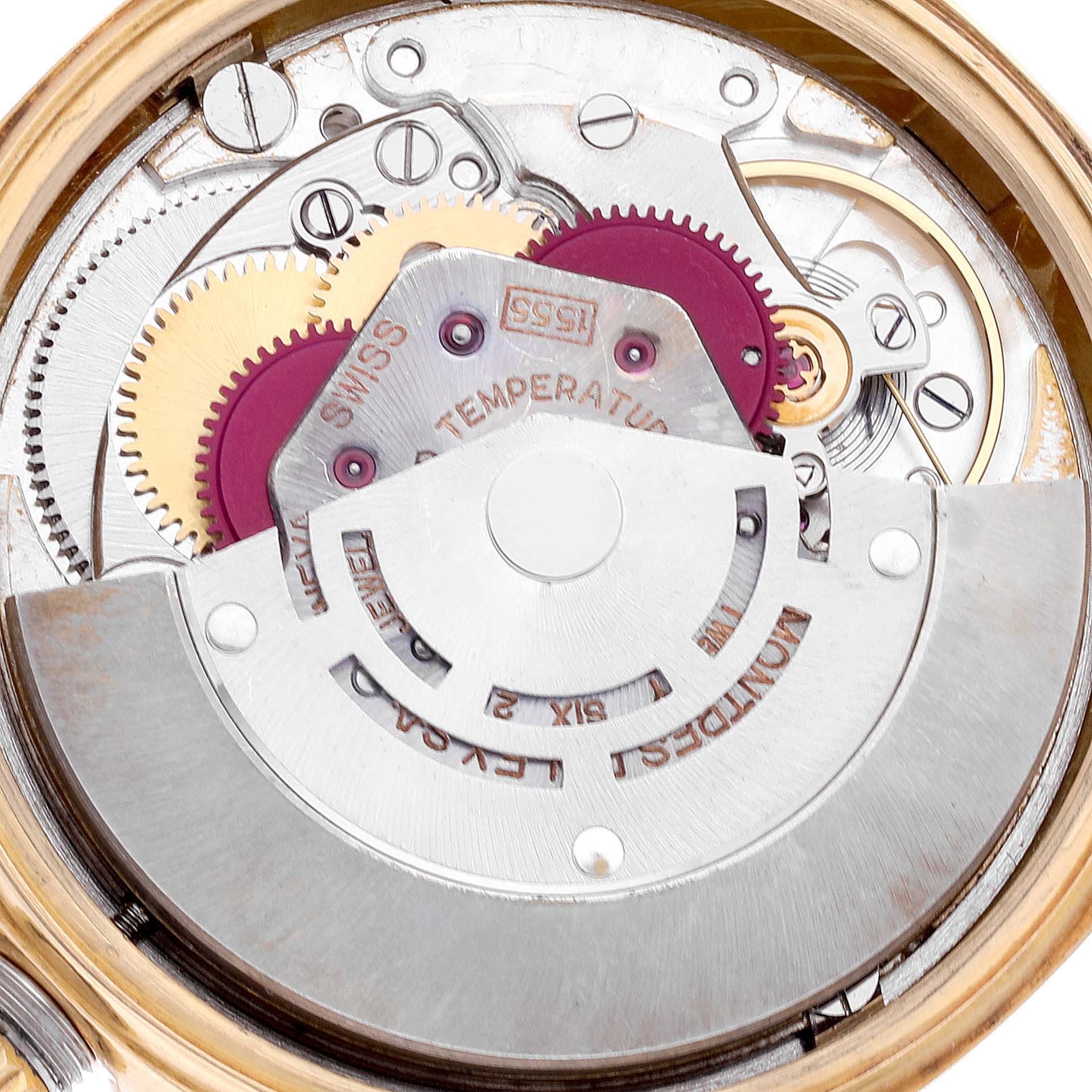 The image shows a close-up view of the internal mechanical components of a Rolex Vintage Collection 1803 Men's Yellow Gold Champagne Dial 1803 Men's Yellow Gold Champagne Dial watch.