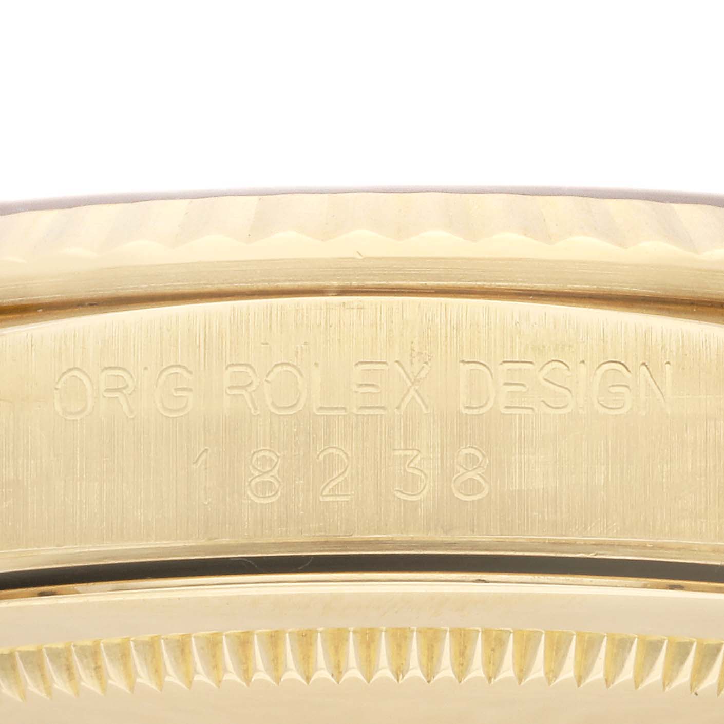The image shows a close-up of the side of a Rolex President 18238 Men's Yellow Gold White Dial 18238 Men's Yellow Gold White Dial model watch, highlighting the "ORG ROLEX DESIGN" and model number 18238.