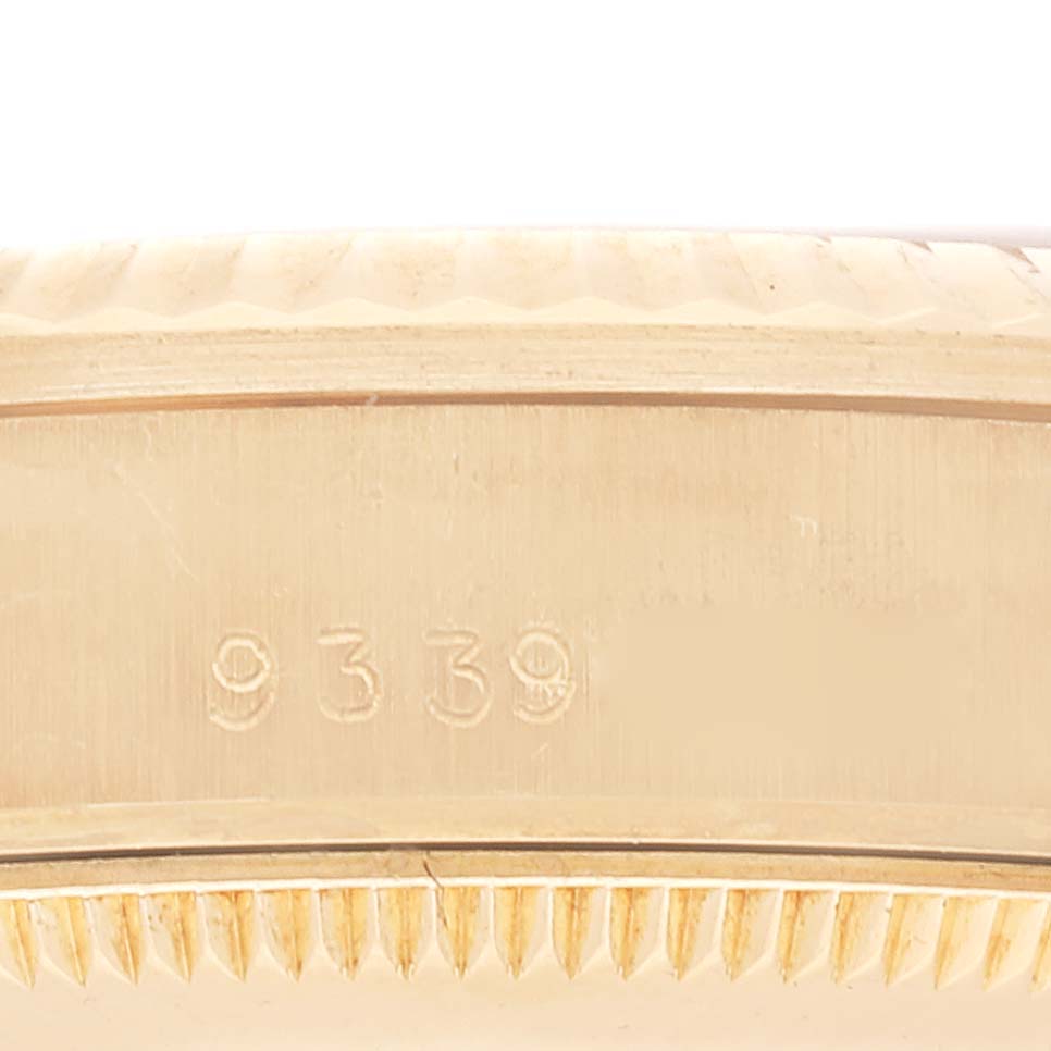 The image shows a close-up of the serial number engraving on the case of a Rolex President 68278 Women
s Yellow Gold Champagne Dial 68278 Women
s Yellow Gold Champagne Dial model watch.