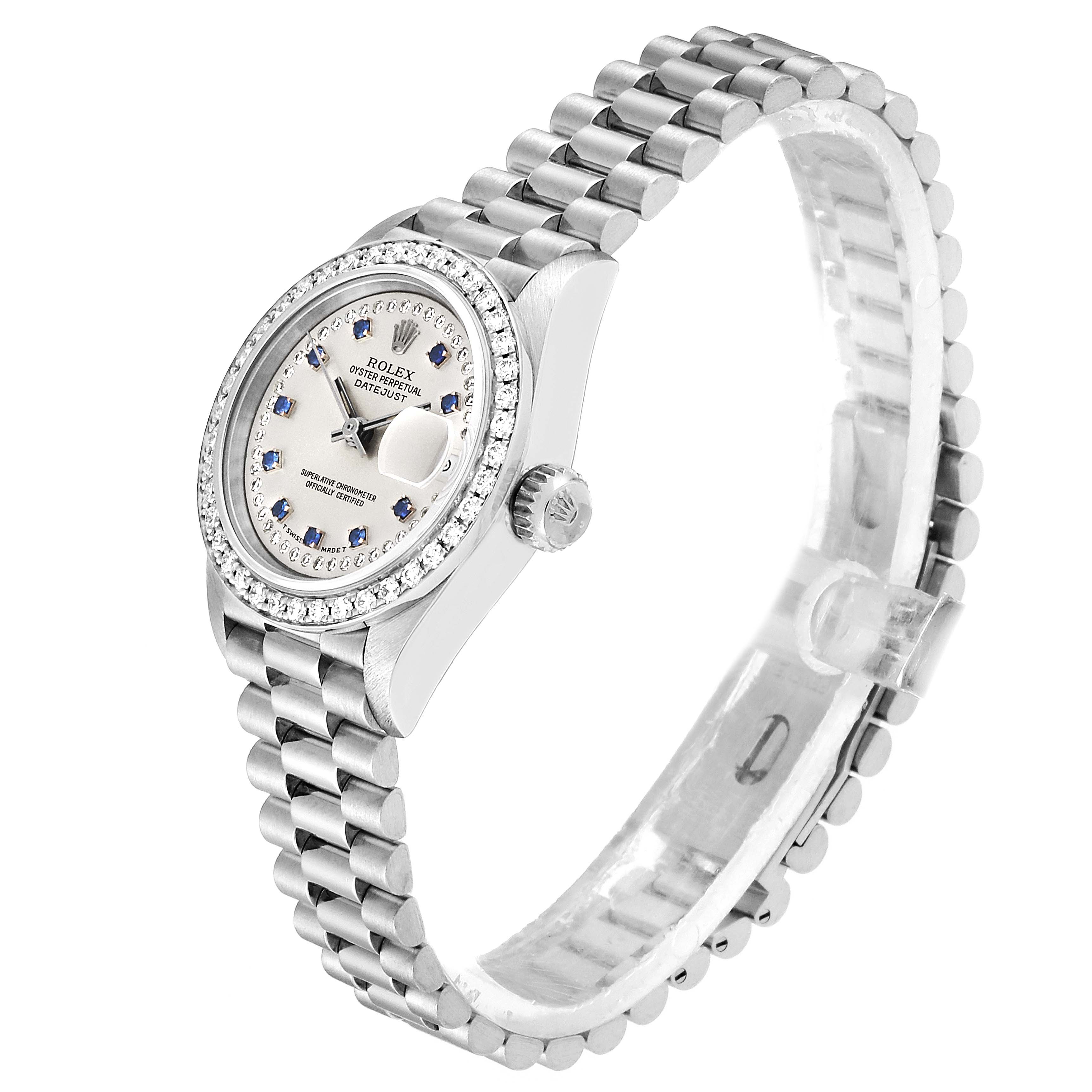 The Rolex President 69136 Women
s Platinum Silver Dial 69136 Women
s Platinum Silver Dial model watch is shown at a slight angle, displaying the face, bezel, side crown, and partial bracelet.