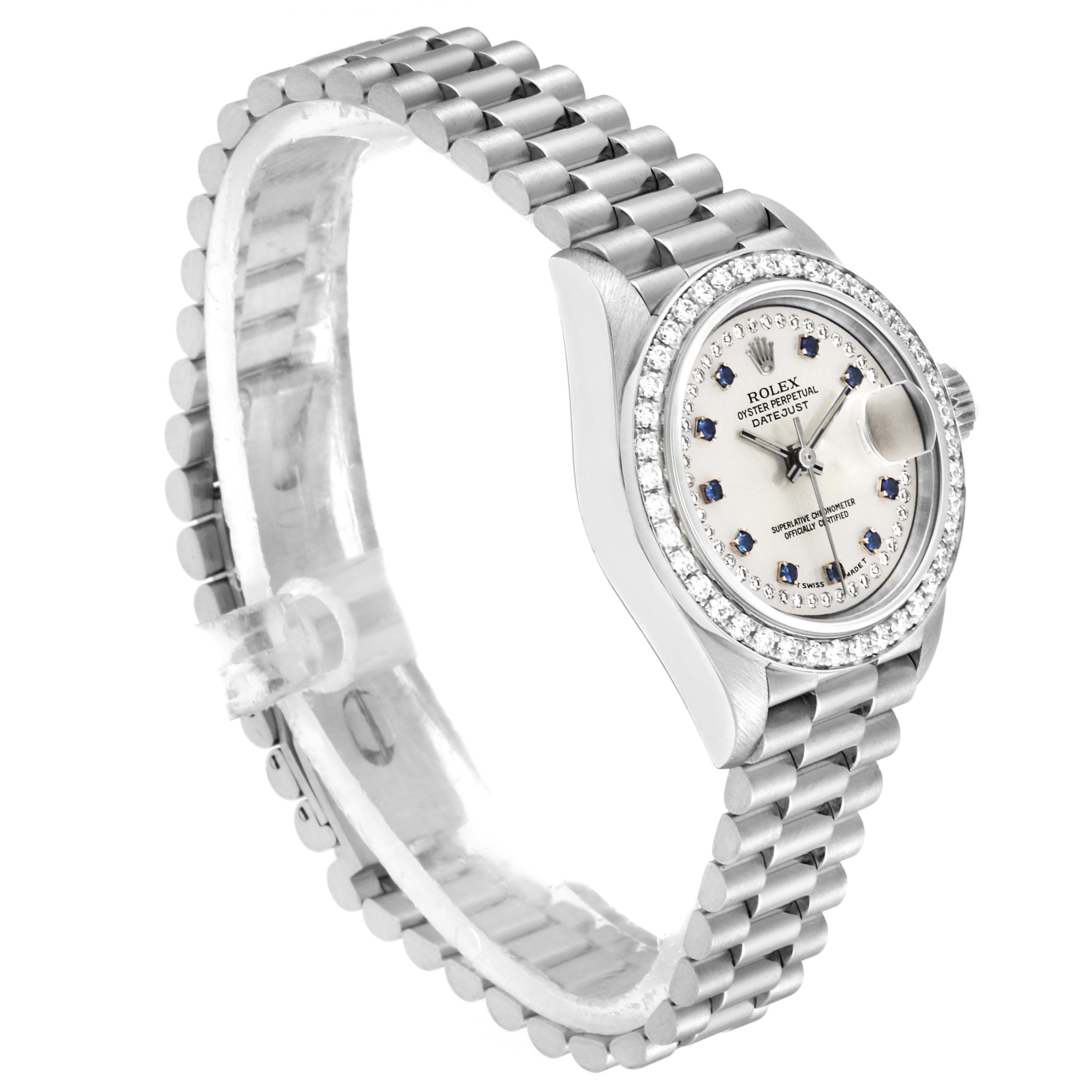 The image shows an angled view of a Rolex President 69136 Women
s Platinum Silver Dial 69136 Women
s Platinum Silver Dial model watch, highlighting the dial, bezel, and bracelet.