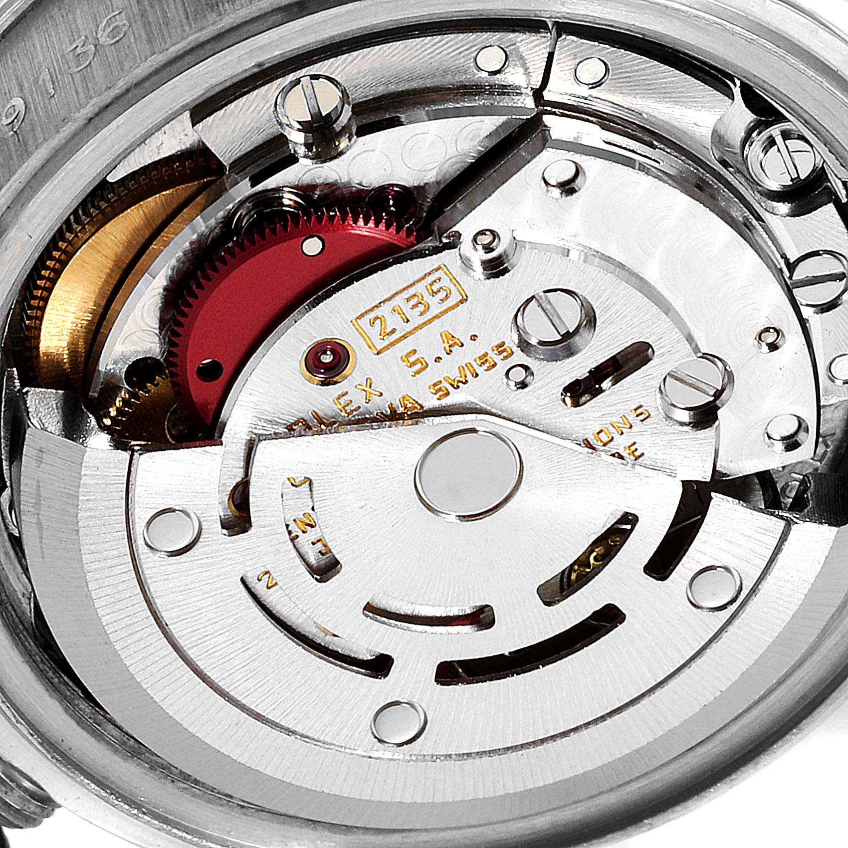 This image shows a close-up view of the movement and inner workings of a Rolex President 69136 Women
s Platinum Silver Dial 69136 Women
s Platinum Silver Dial model watch.