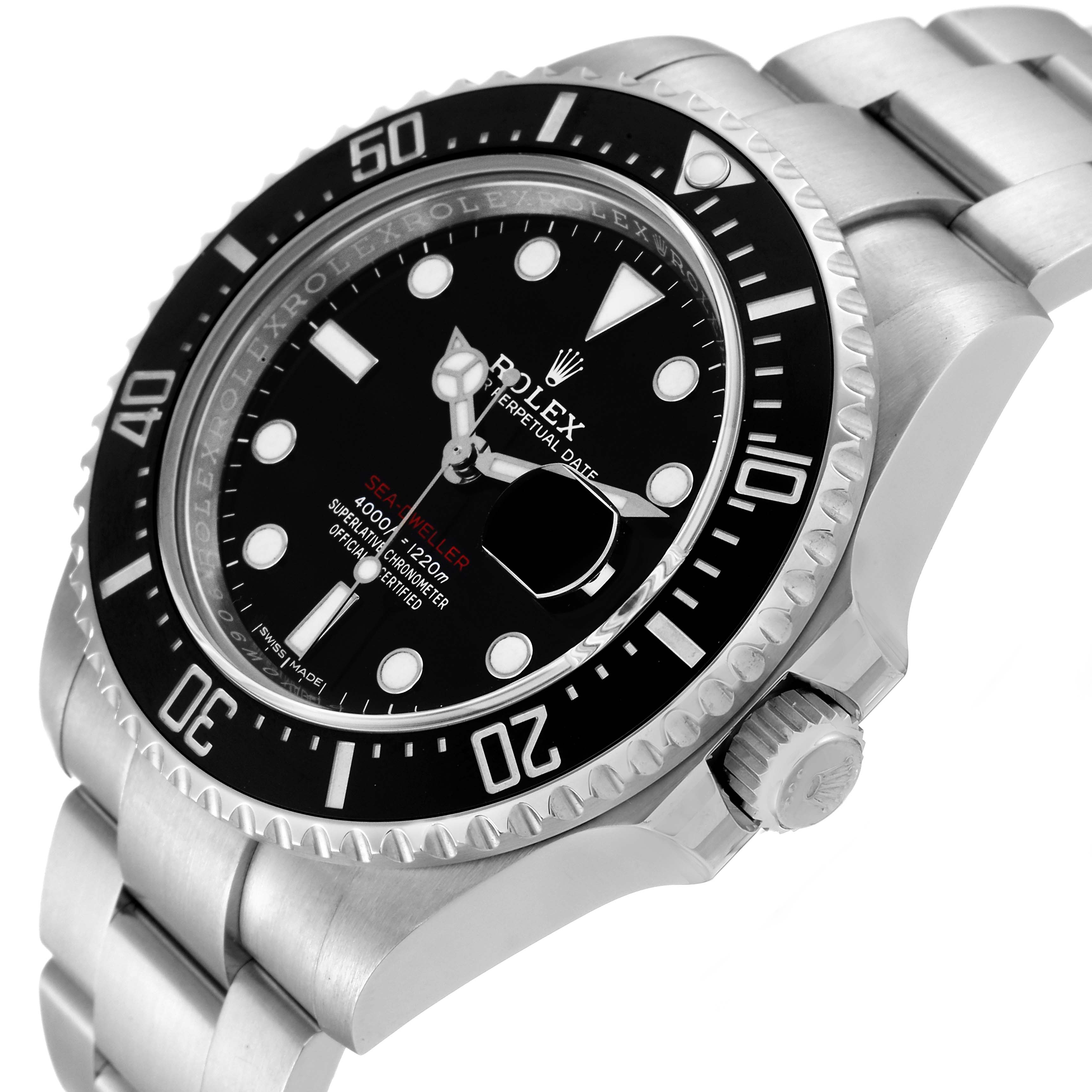 The image shows a Rolex Sea-Dweller 126600 Men
s Stainless Steel Black Dial 126600 Men
s Stainless Steel Black Dial watch at a right-side angle, highlighting the bezel, dial, and bracelet.