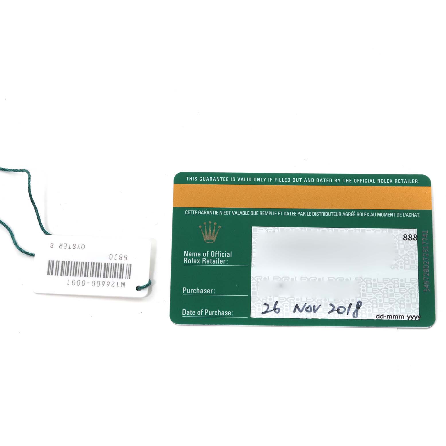 The image shows the warranty card and a hang tag for the Rolex Sea-Dweller 126600 Men
s Stainless Steel Black Dial 126600 Men
s Stainless Steel Black Dial model.