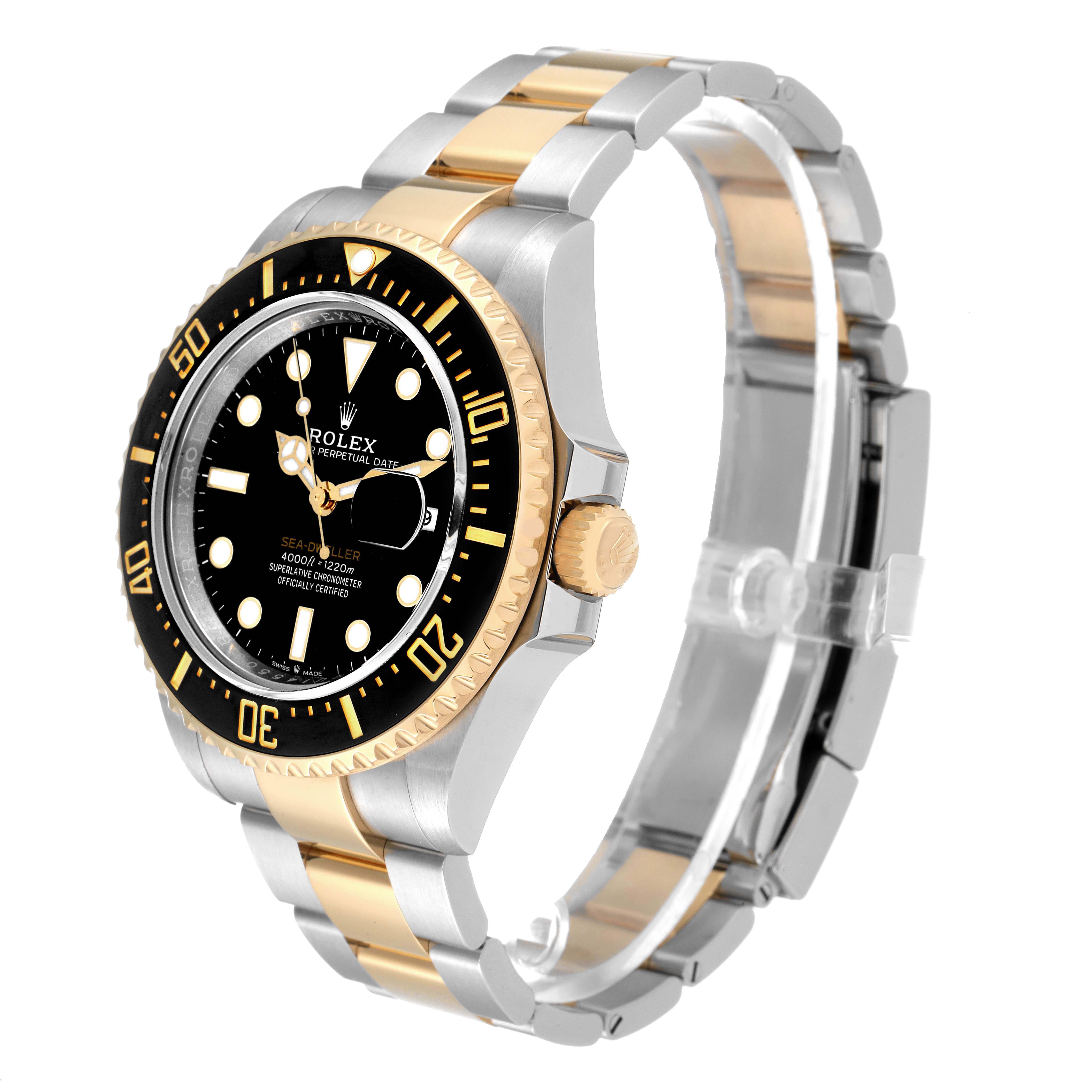 The Rolex Sea-Dweller 126603 Men's Steel and Gold (two tone) Black Dial 126603 Men's Steel and Gold (two tone) Black Dial watch is shown at a 3/4 angle, highlighting its gold and stainless steel bracelet and black dial.