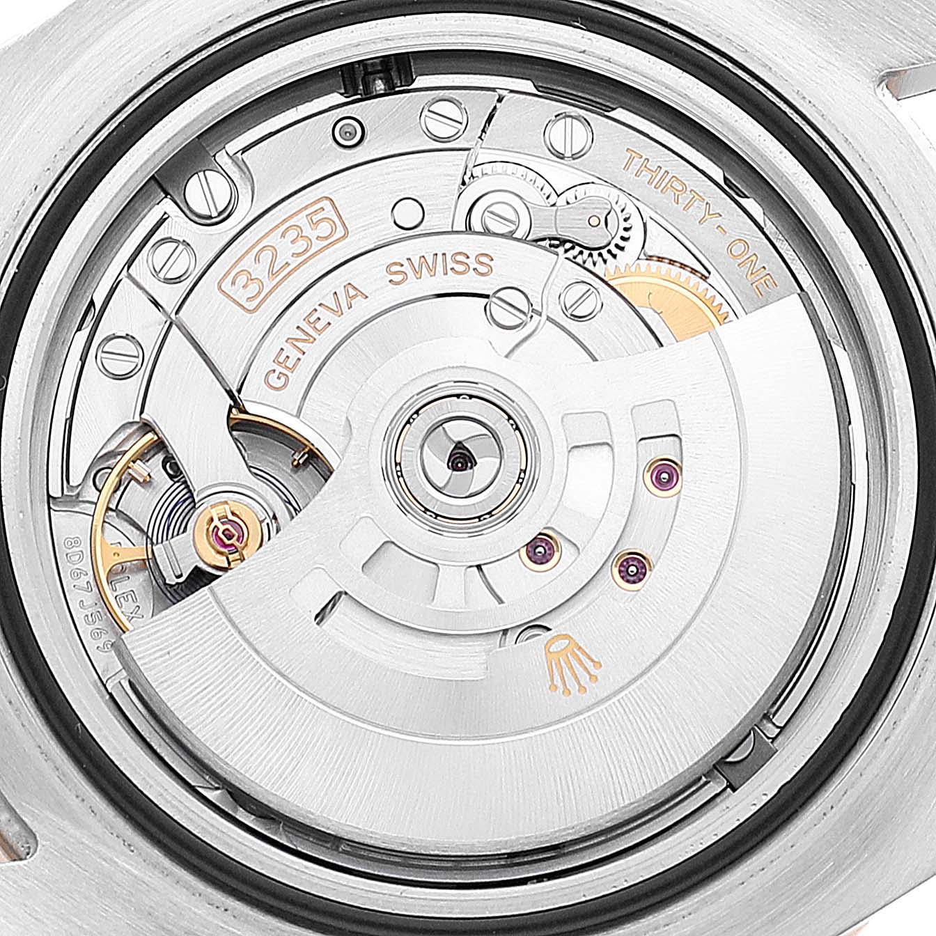 The image shows a close-up of the movement and inner mechanism of a Rolex Sea-Dweller 126603 Men's Steel and Gold (two tone) Black Dial 126603 Men's Steel and Gold (two tone) Black Dial watch.