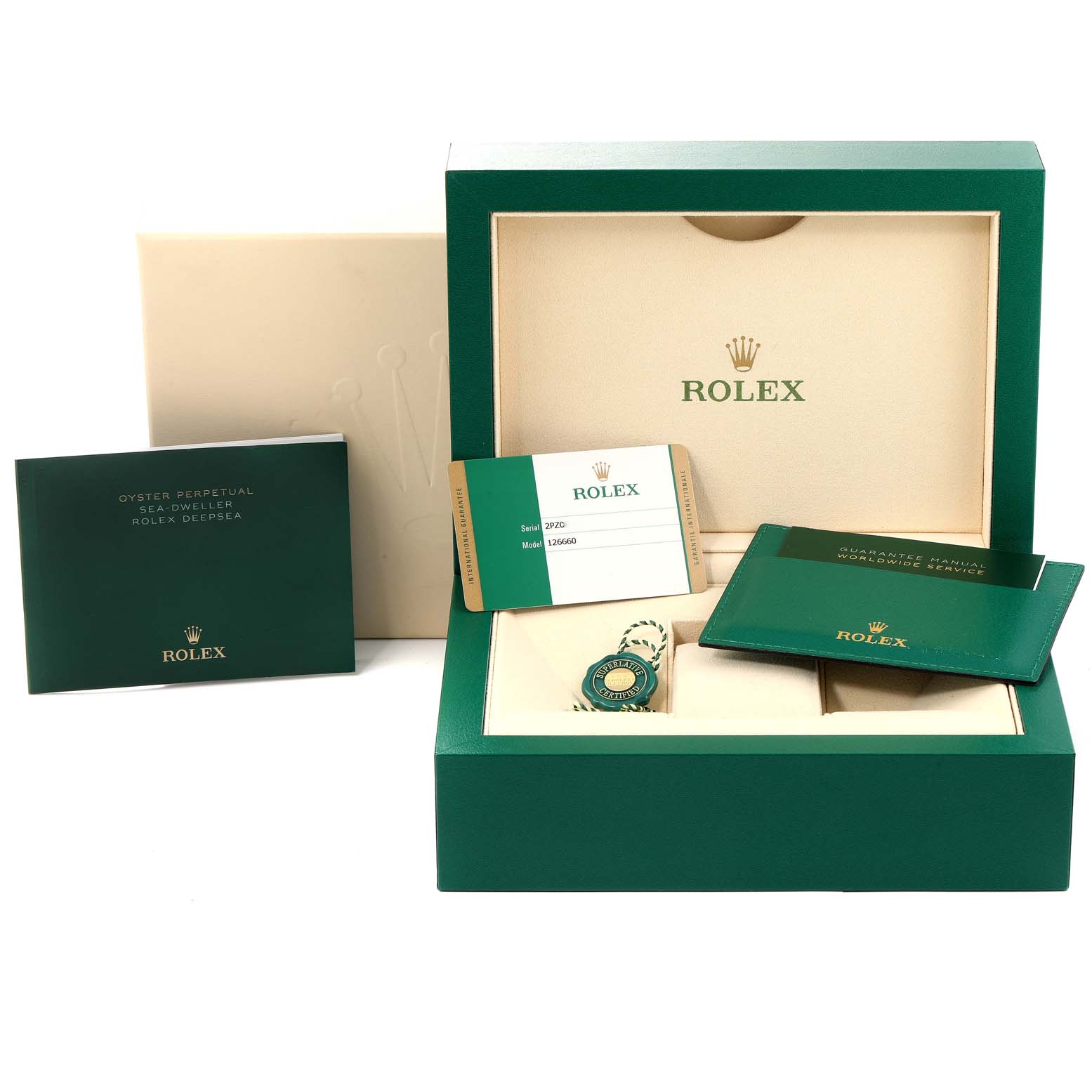 The image shows the packaging and accessories for a Rolex Sea-Dweller 126660 Men
s Stainless Steel Blue Dial 126660 Men
s Stainless Steel Blue Dial, including documentation, cards, and a box.