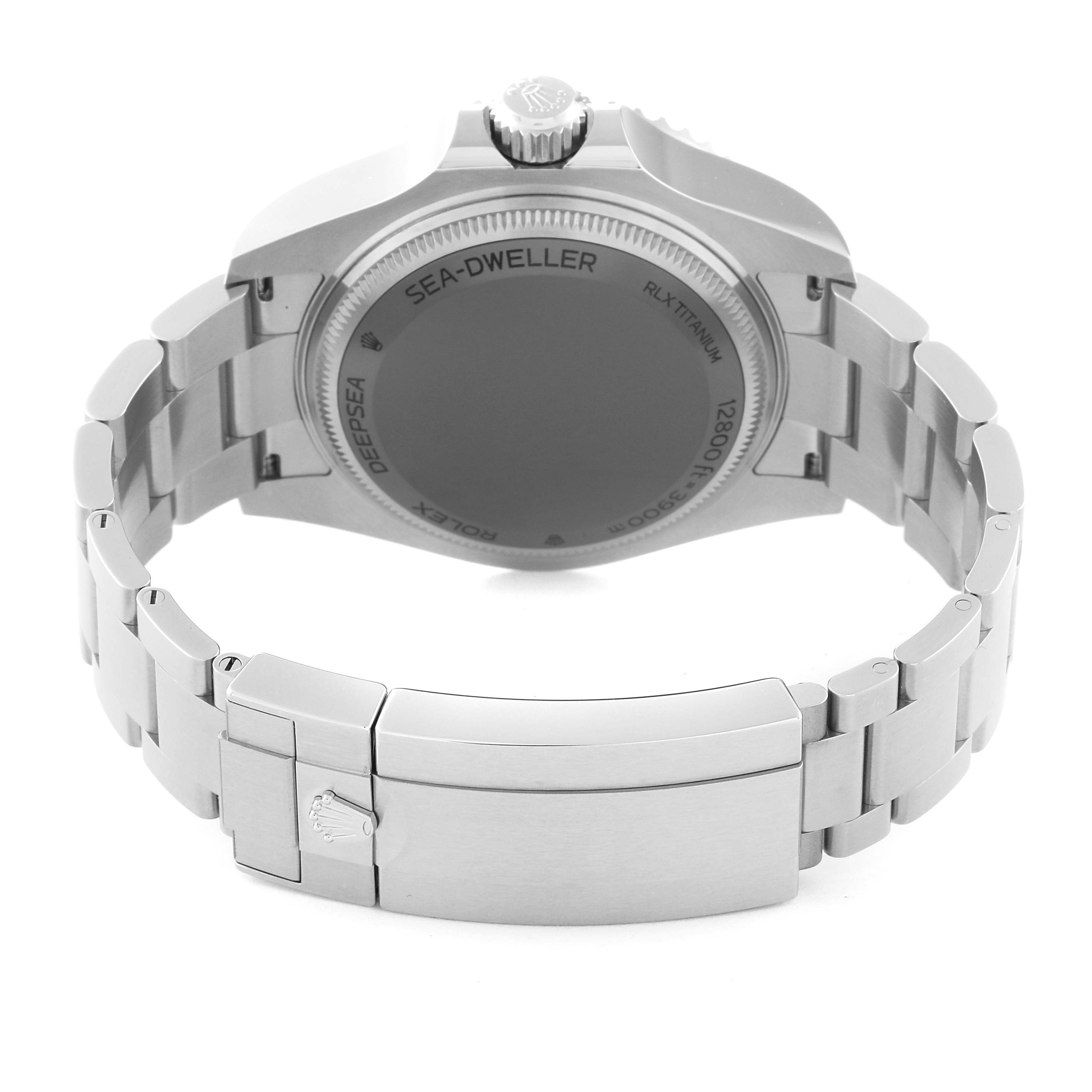 The photo shows the back case, bezel, crown, and bracelet of a Rolex Sea-Dweller 136660 Men's Stainless Steel Blue Dial 136660 Men's Stainless Steel Blue Dial watch from a rear angle.