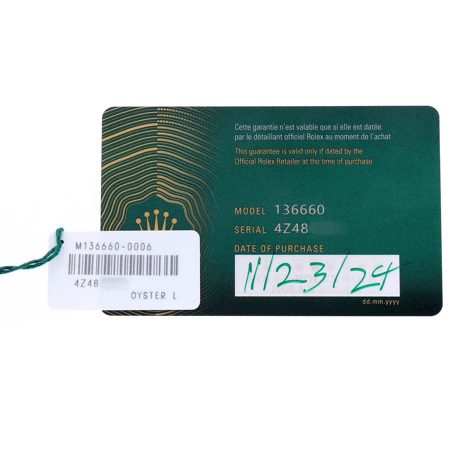 The image shows the guarantee card for the Rolex Sea-Dweller 136660 Men's Stainless Steel Black Dial model 136660, displaying model and serial numbers.