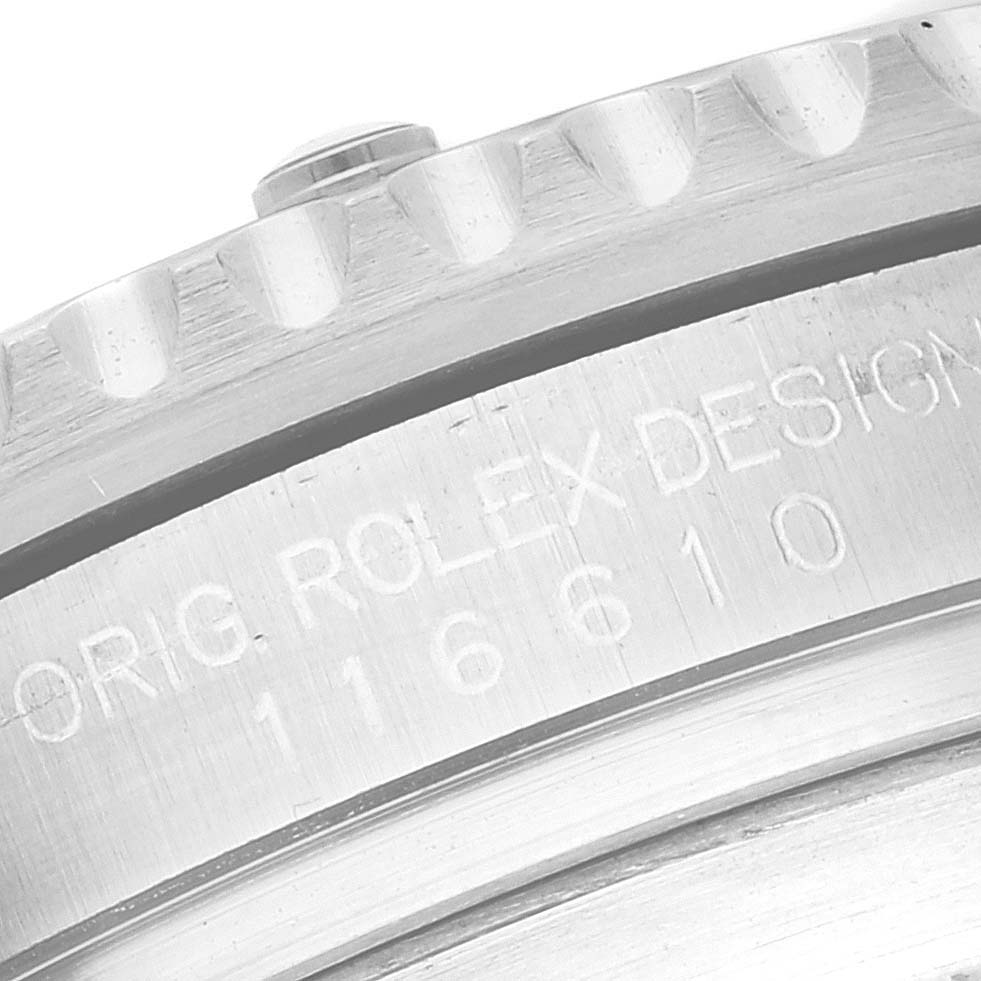 This image shows a close-up of the side of a Rolex Submariner 116610 Men
s Stainless Steel Black Dial 116610 Men
s Stainless Steel Black Dial watch, highlighting the engraving and bezel edge.