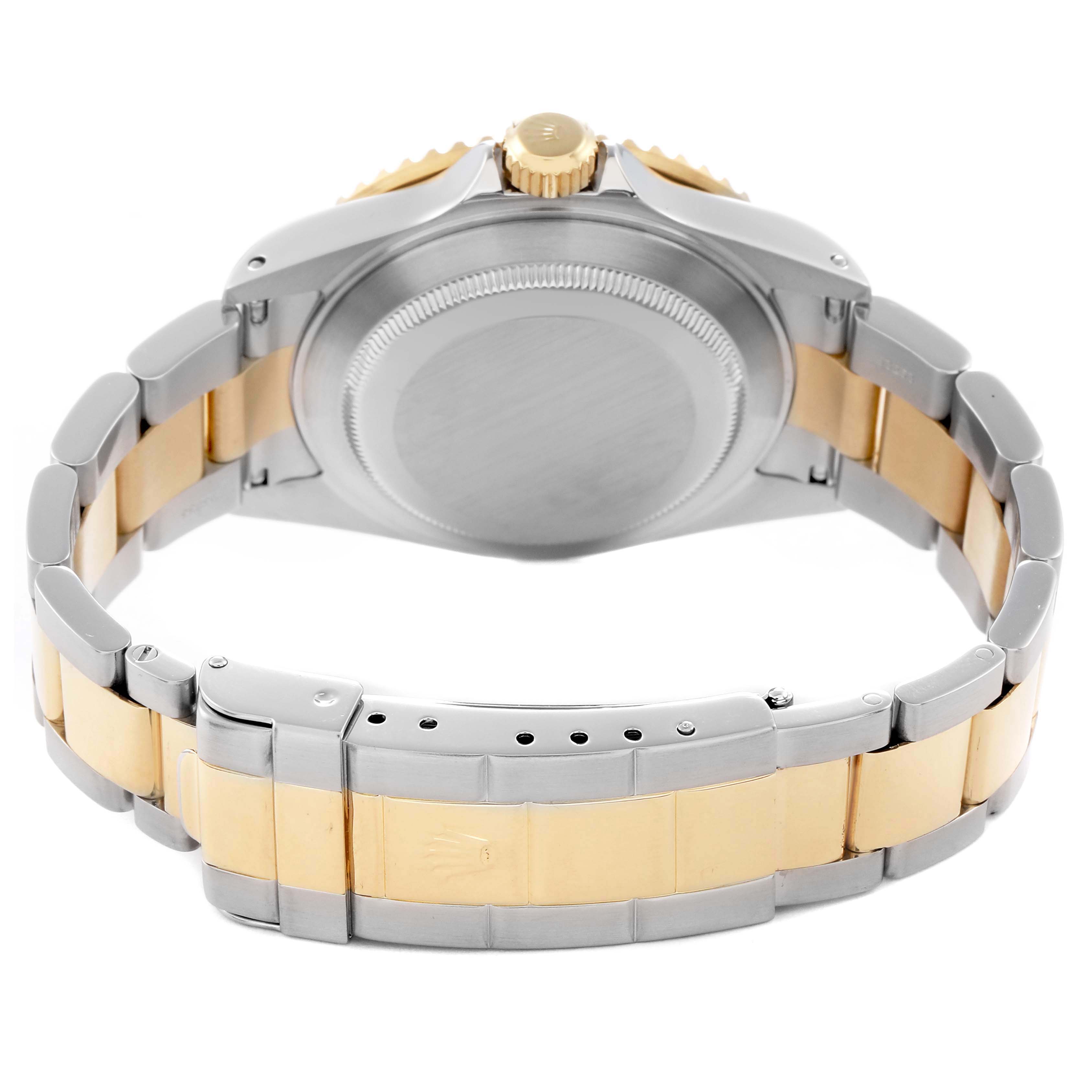 The image shows the back of a Rolex Submariner 16613 Men
s Steel and Gold (two tone) Champagne Dial 16613 Men
s Steel and Gold (two tone) Champagne Dial, including the case back, crown, and the two-tone bracelet.