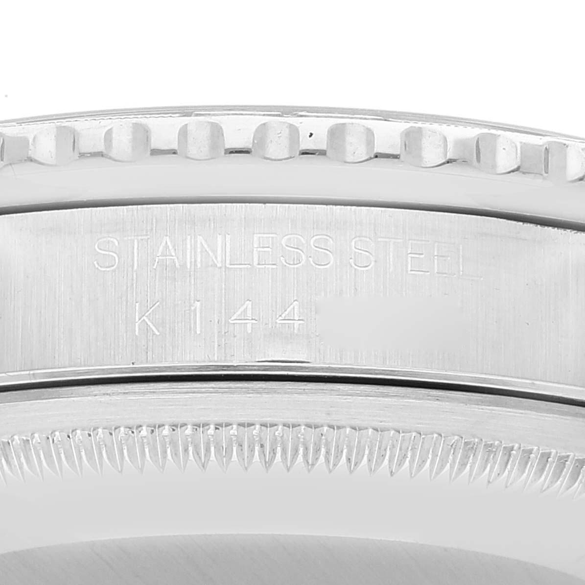 The image shows a close-up of the stainless steel edge and bezel of a Rolex Turn-o-Graph 16264 Men's Stainless Steel Blue Dial 16264 Men's Stainless Steel Blue Dial watch.