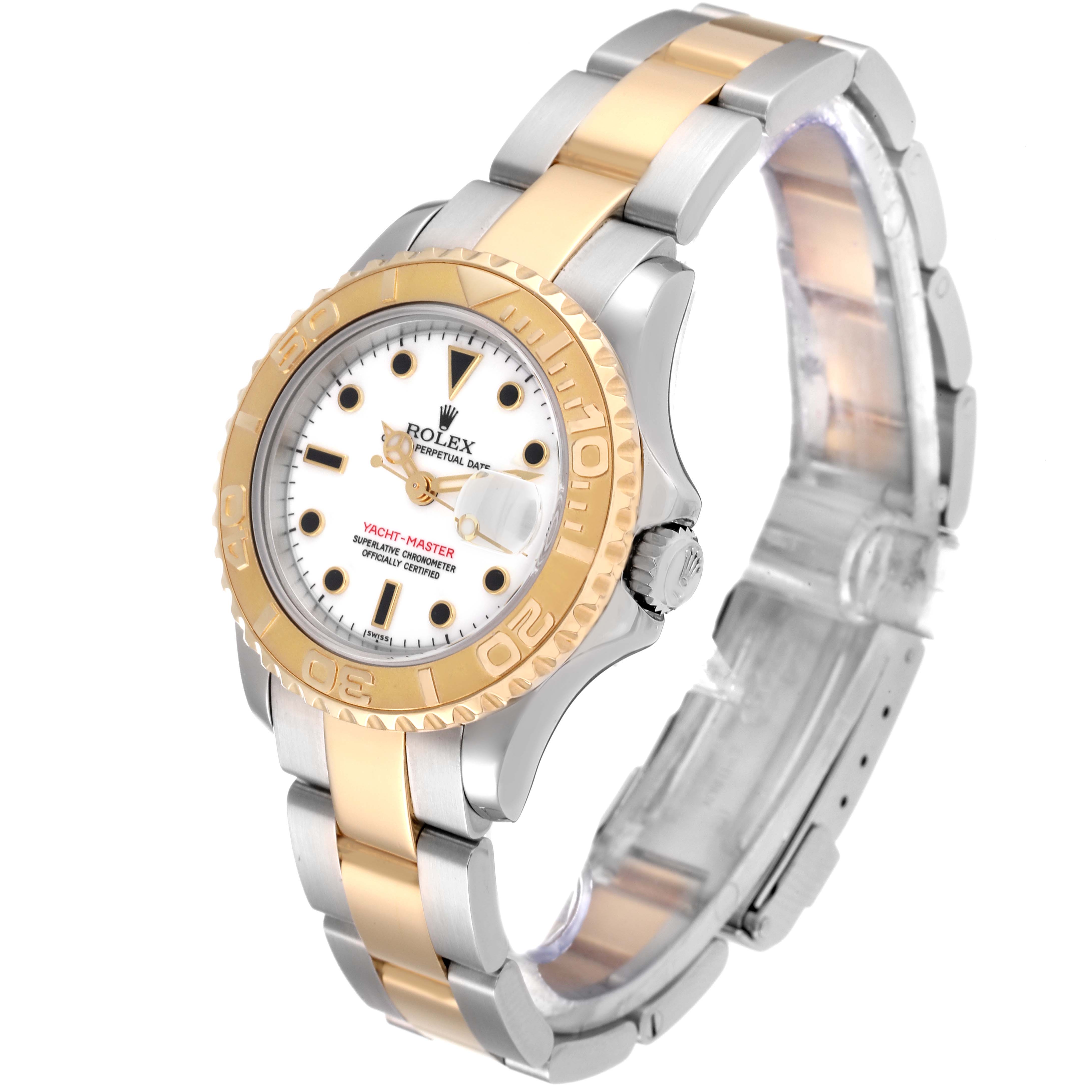 The image shows a Rolex Yacht-Master 69623 Women's Steel and Gold (two tone) White Dial 69623 Women's Steel and Gold (two tone) White Dial watch at a slightly tilted angle, displaying its face, bezel, crown, and bracelet.