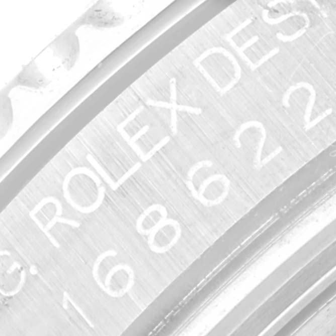 This close-up image shows the engraving "ROLEX DESIGN 168622" within the inner bezel of a Rolex Yacht-Master 168622 Men's Stainless Steel Silver Dial 168622 Men's Stainless Steel Silver Dial watch.