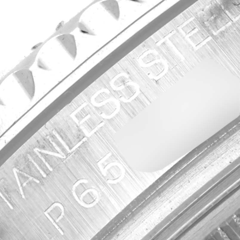 This image shows a close-up of the bezel and inner case of a Rolex Yacht-Master 168622 Men's Stainless Steel Silver Dial 168622 Men's Stainless Steel Silver Dial watch, highlighting the "STAINLESS STEEL" inscription.