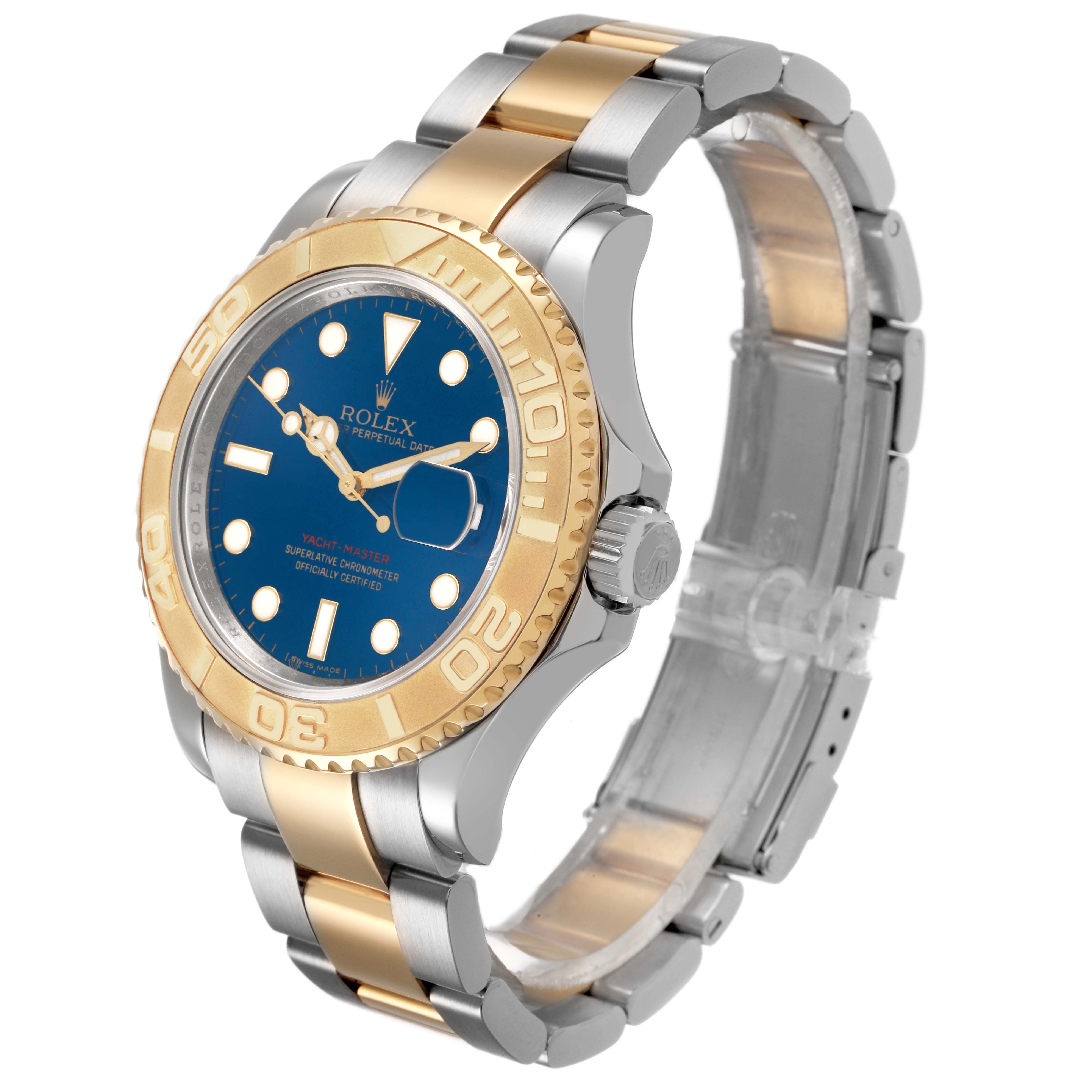 The Rolex Yacht-Master 16623 Men's Steel and Gold (two tone) Blue Dial watch is shown at a three-quarter angle, highlighting its blue dial, gold bezel, and two-tone bracelet.