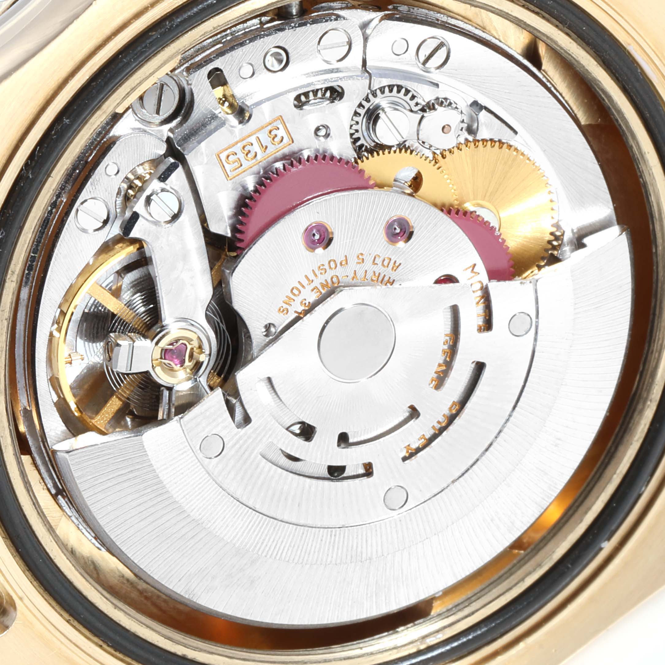 This close-up image shows the intricate internal mechanism of a Rolex Yacht-Master 16628 Men's Yellow Gold White Dial 16628 Men's Yellow Gold White Dial watch.
