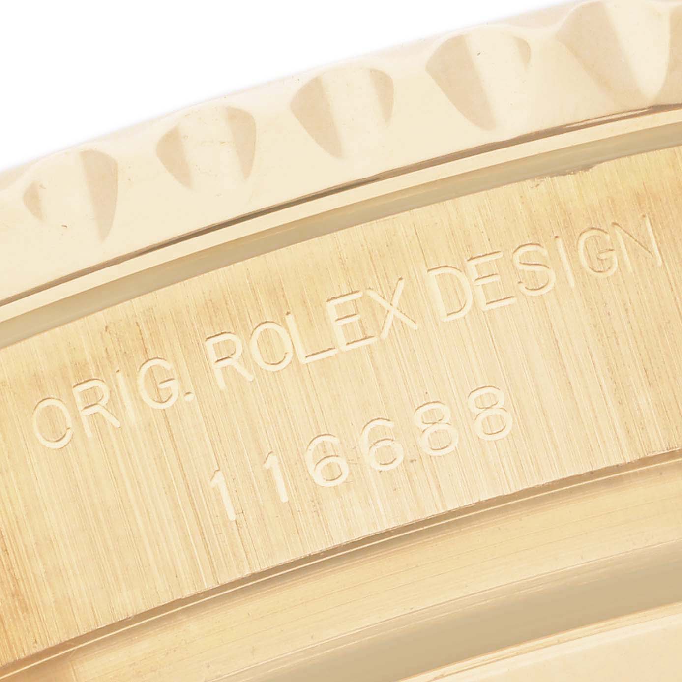 Close-up of a Rolex Yacht-Master 116688 Men's Yellow Gold White Dial 116688 Men's Yellow Gold White Dial model showing the engraved text on the case side.