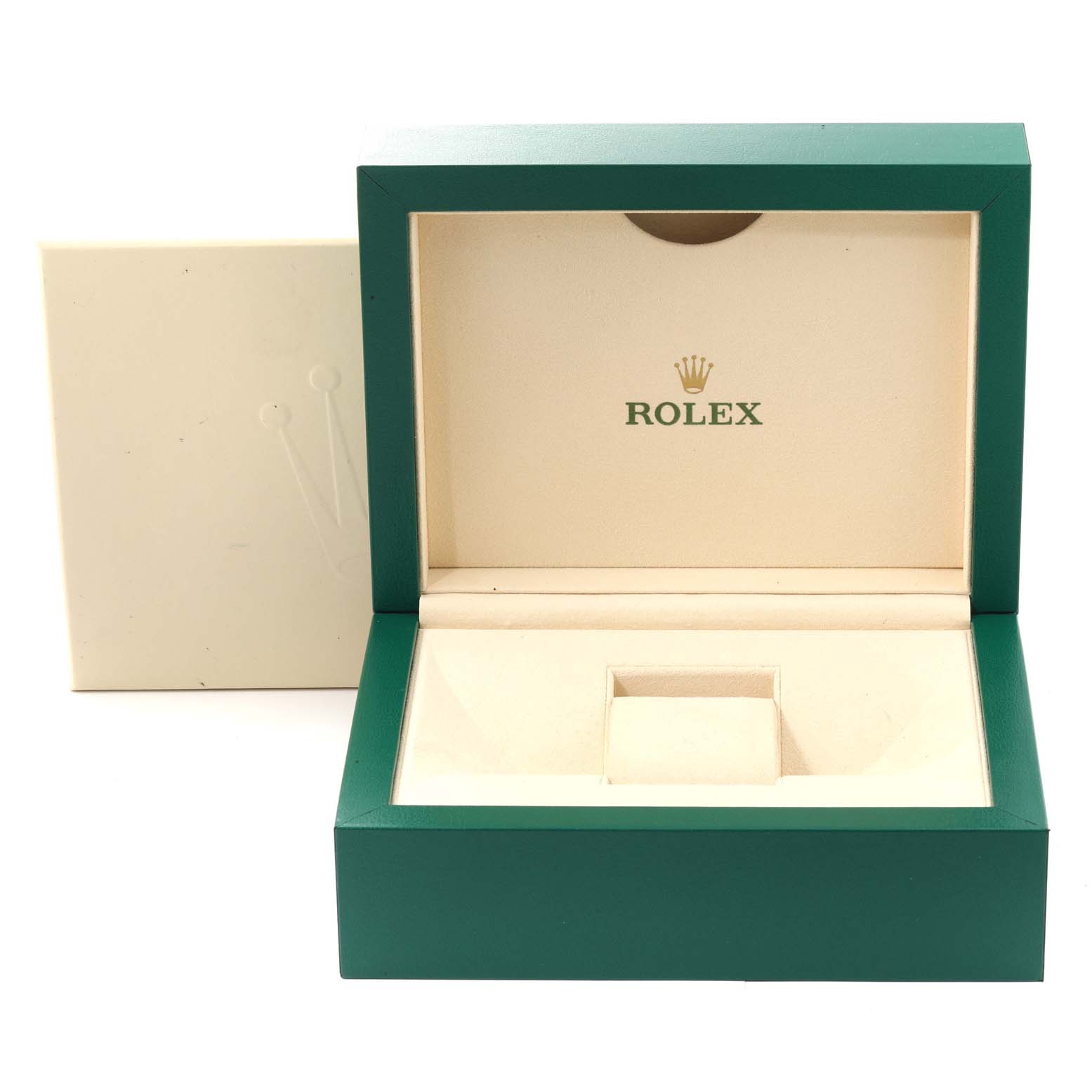 The image shows an open green and cream Rolex box for the Yacht-Master model, with the outer sleeve beside it.