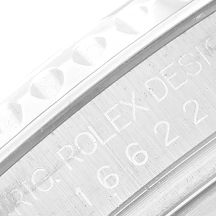 This close-up image shows part of the bezel and the side engraving on the Rolex Yacht-Master 16622 Men's Stainless Steel Silver Dial 16622 Men's Stainless Steel Silver Dial watch.