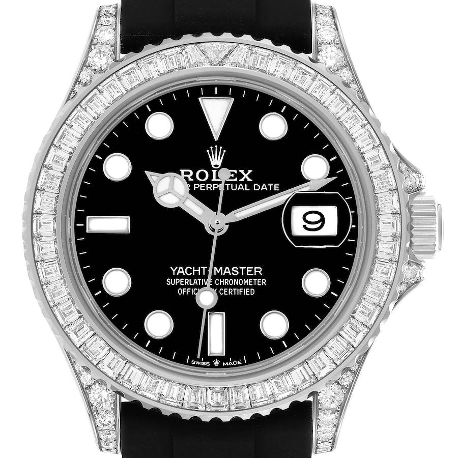The Rolex Yacht-Master watch is shown from the front, highlighting its black dial, bezel, and markers.