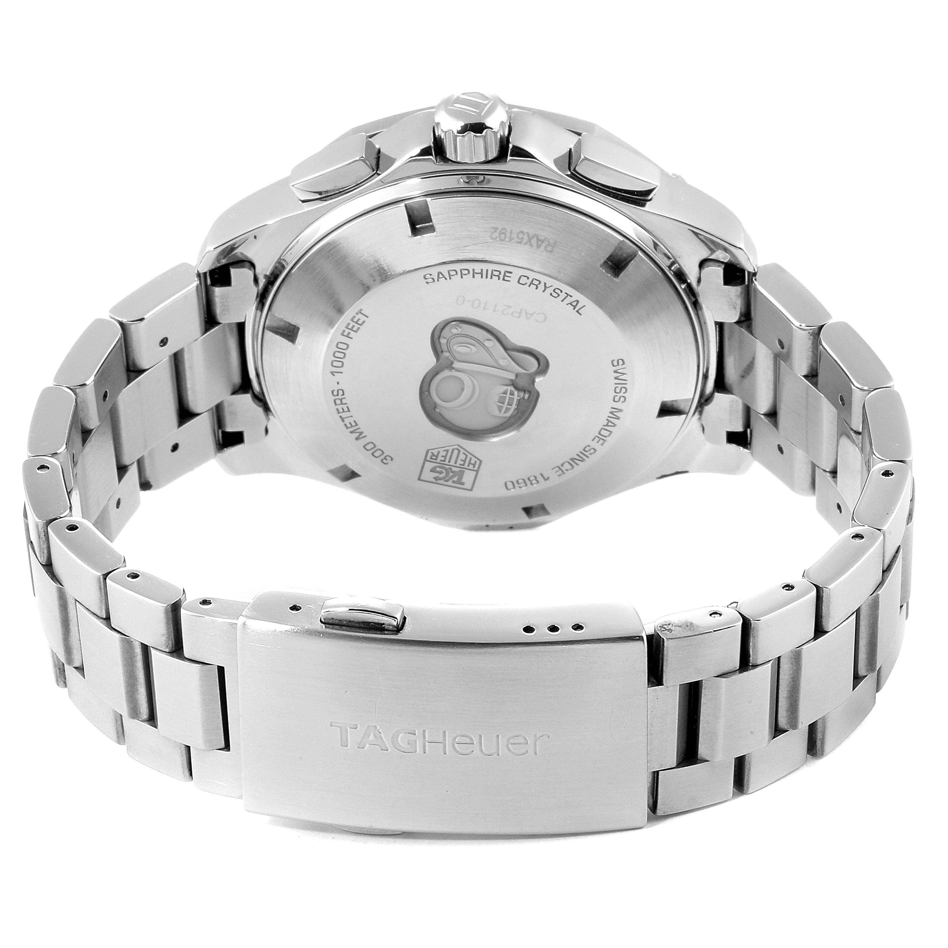 The image shows the back and clasp of a Tag Heuer Aquaracer CAP2110.BA0833 Men's Stainless Steel Black Dial CAP2110.BA0833 Men's Stainless Steel Black Dial watch, highlighting the case back and metal bracelet.