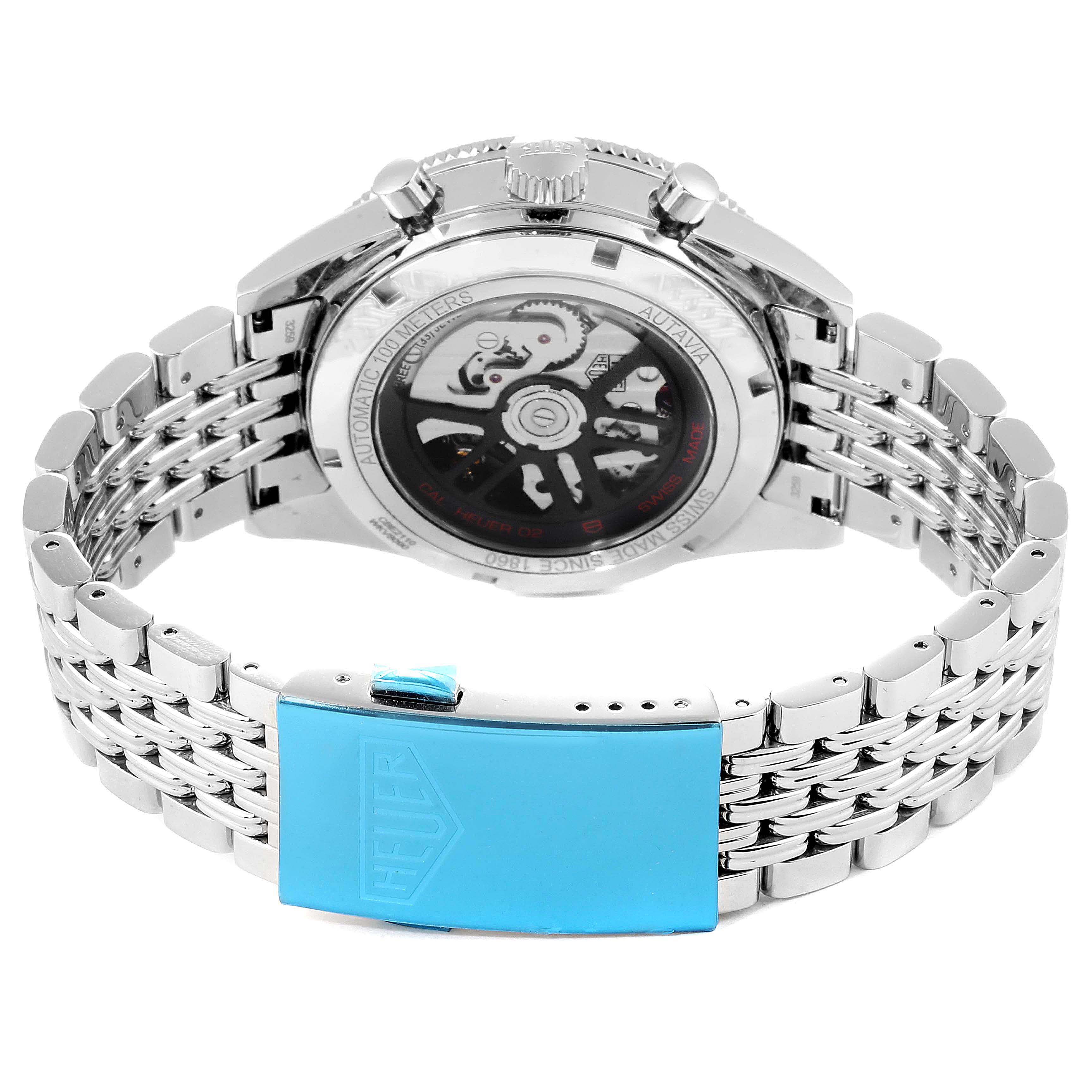 The image shows the back view of a Tag Heuer Autavia CBE2110.BA0687 Men's Stainless Steel Black Dial CBE2110.BA0687 Men's Stainless Steel Black Dial watch, highlighting the movement and stainless steel bracelet.