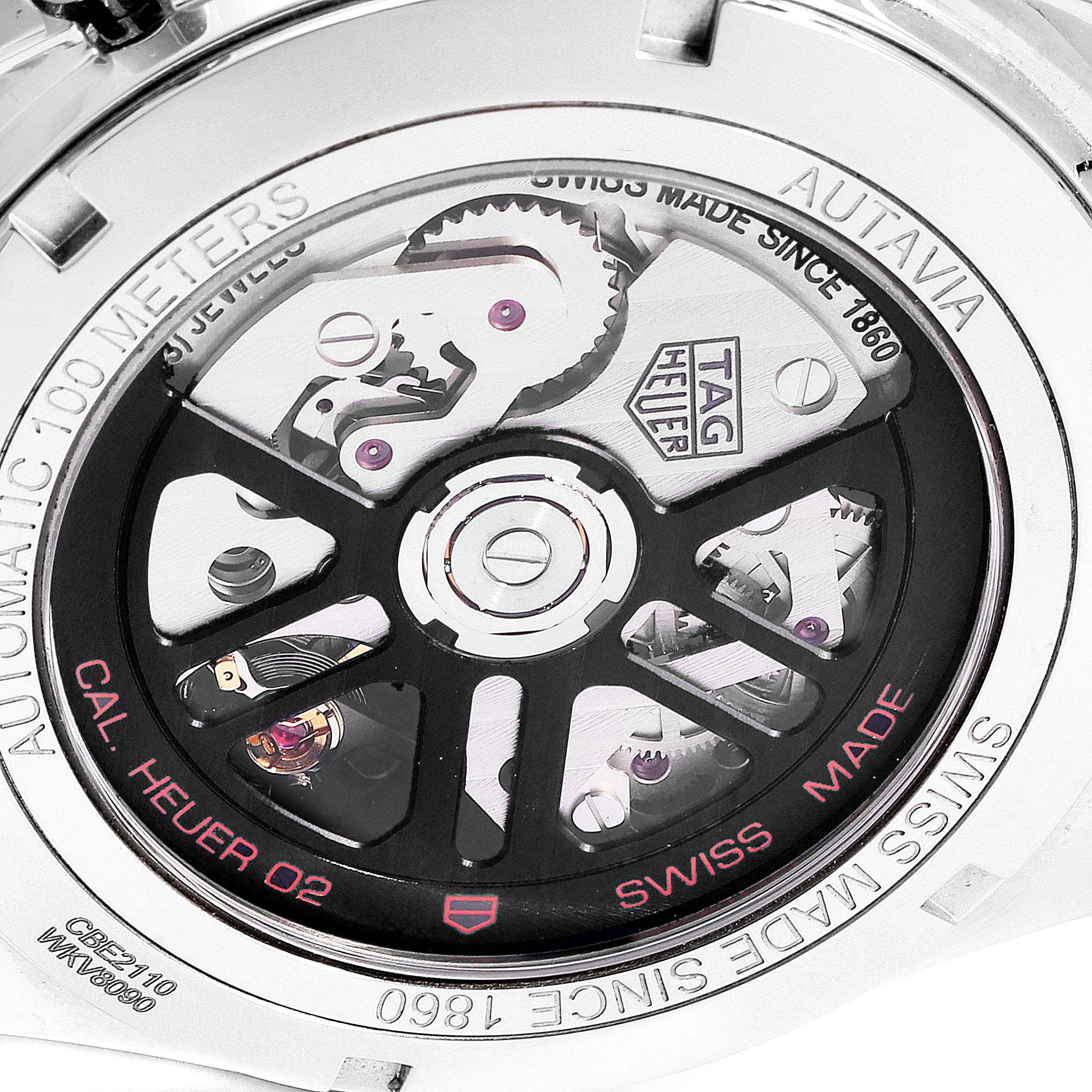 This image shows the back of the Tag Heuer Autavia CBE2110.BA0687 Men's Stainless Steel Black Dial CBE2110.BA0687 Men's Stainless Steel Black Dial watch, revealing its internal mechanical movements and engravings.