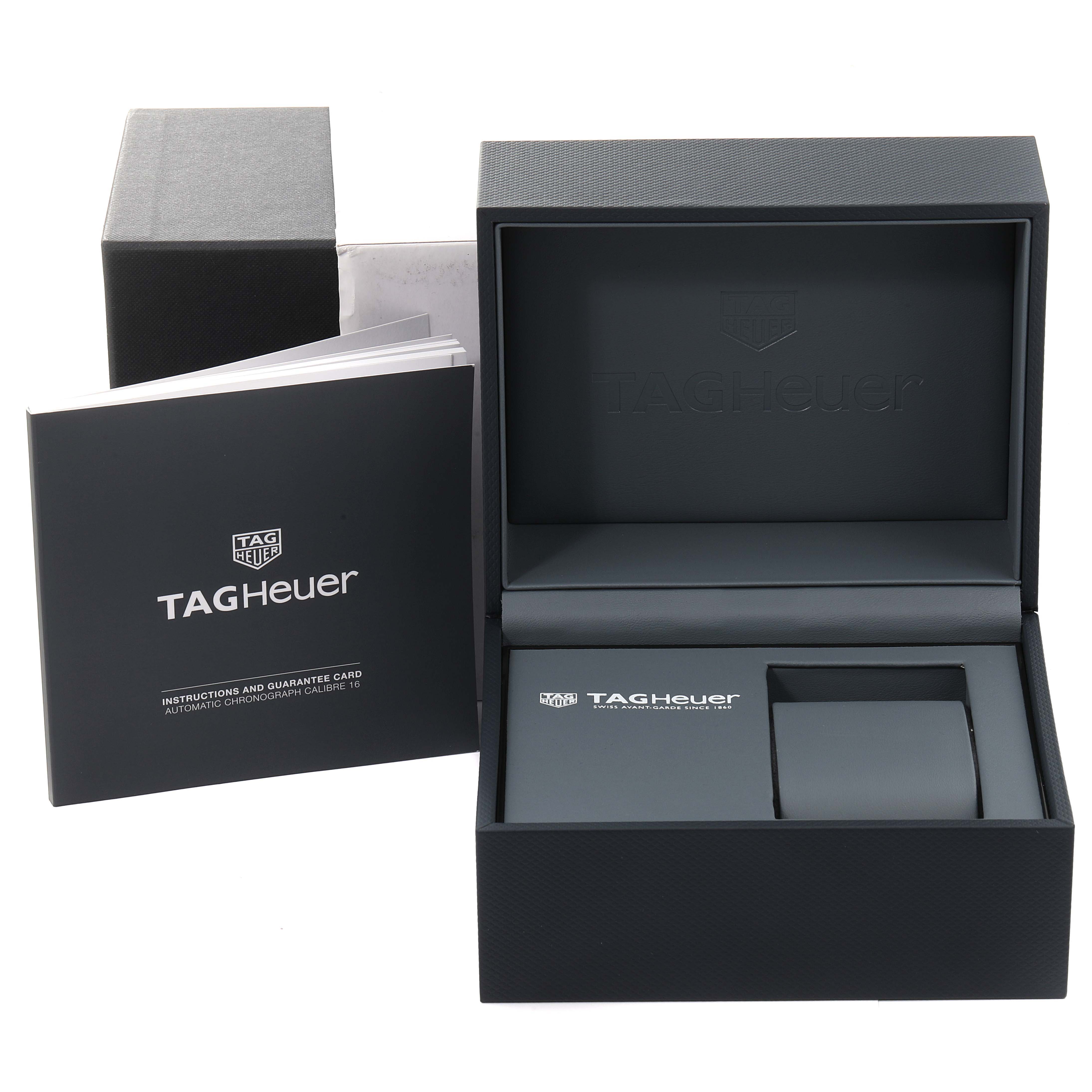 The image shows an open Tag Heuer Carrera CV201AR.BA0715 Men's Stainless Steel Blue Dial CV201AR.BA0715 Men's Stainless Steel Blue Dial watch box and its instruction manual.