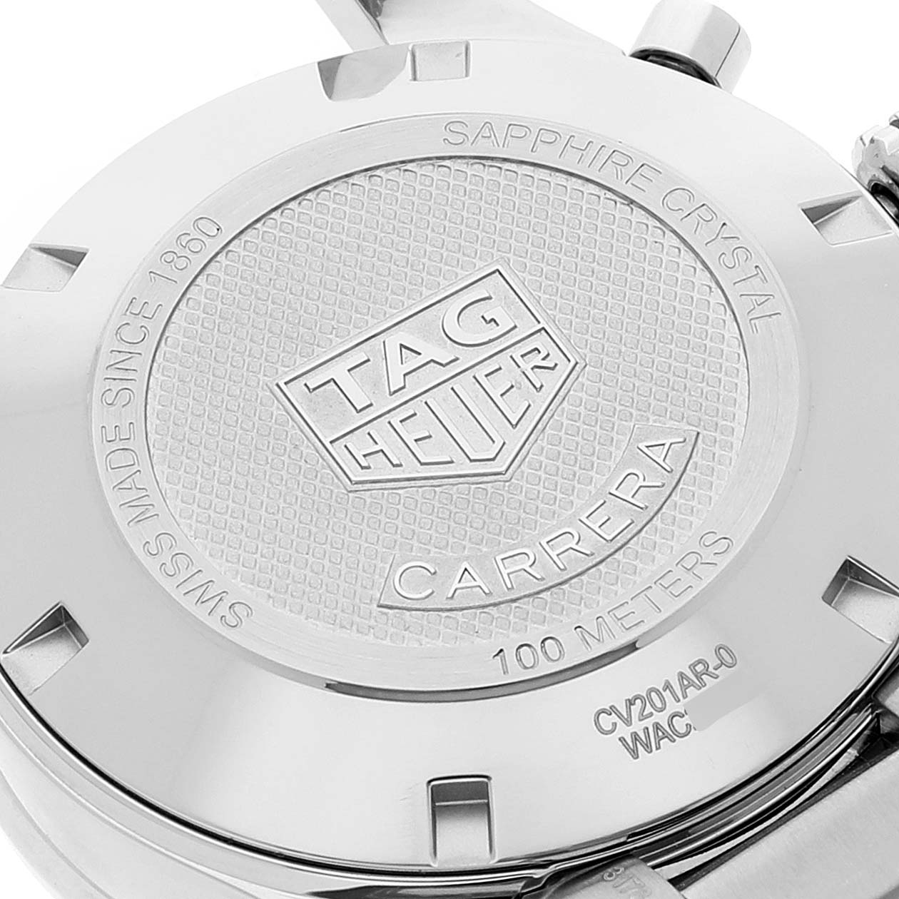 The image shows the back case of a Tag Heuer Carrera CV201AR.BA0715 Men's Stainless Steel Blue Dial CV201AR.BA0715 Men's Stainless Steel Blue Dial watch, featuring branding and specifications.